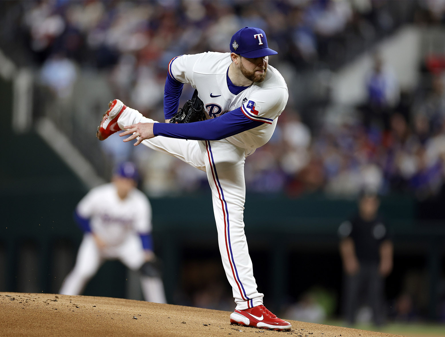 ARLINGTON, TEXAS - OCTOBER 28: Jordan Montgomery #52 of the Texas Rangers pitches in the first inning against the Arizona Diamondbacks during Game Two of the World Series at Globe Life Field on October 28, 2023 in Arlington, Texas. (Photo by Carmen Mandato/Getty Images)