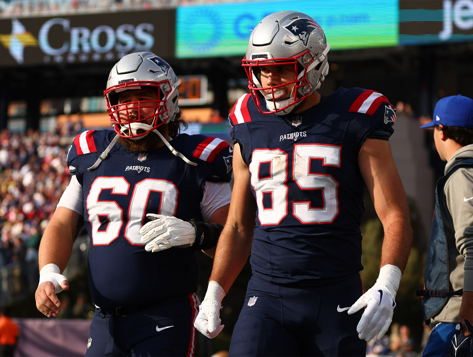 FOXBOROUGH, MASSACHUSETTS - NOVEMBER 05: Hunter Henry #85 of the New England Patriots celebrates after a touchdown with David Andrews #60 during the first half in the game against the Washington Commanders at Gillette Stadium on November 05, 2023 in Foxborough, Massachusetts. (Photo by Maddie Meyer/Getty Images)