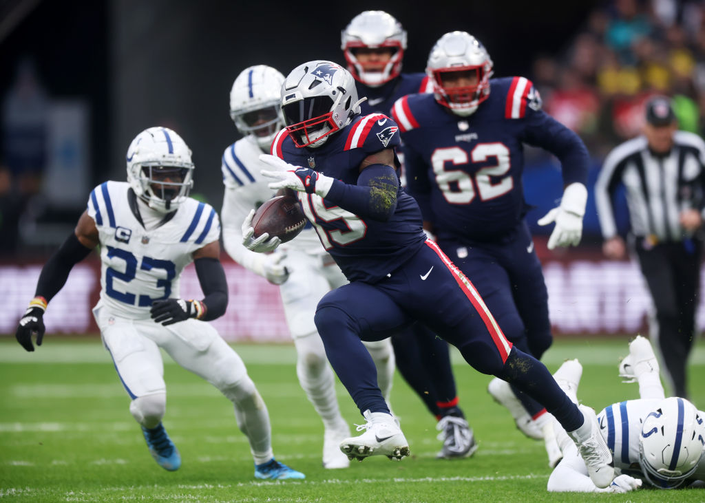FRANKFURT AM MAIN, GERMANY - NOVEMBER 12: Ezekiel Elliott #15 of the New England Patriots runs the ball in the second quarter during the NFL match between the Indianapolis Colts and the New England Patriots at Deutsche Bank Park on November 12, 2023 in Frankfurt am Main, Germany. (Photo by Alex Grimm/Getty Images)