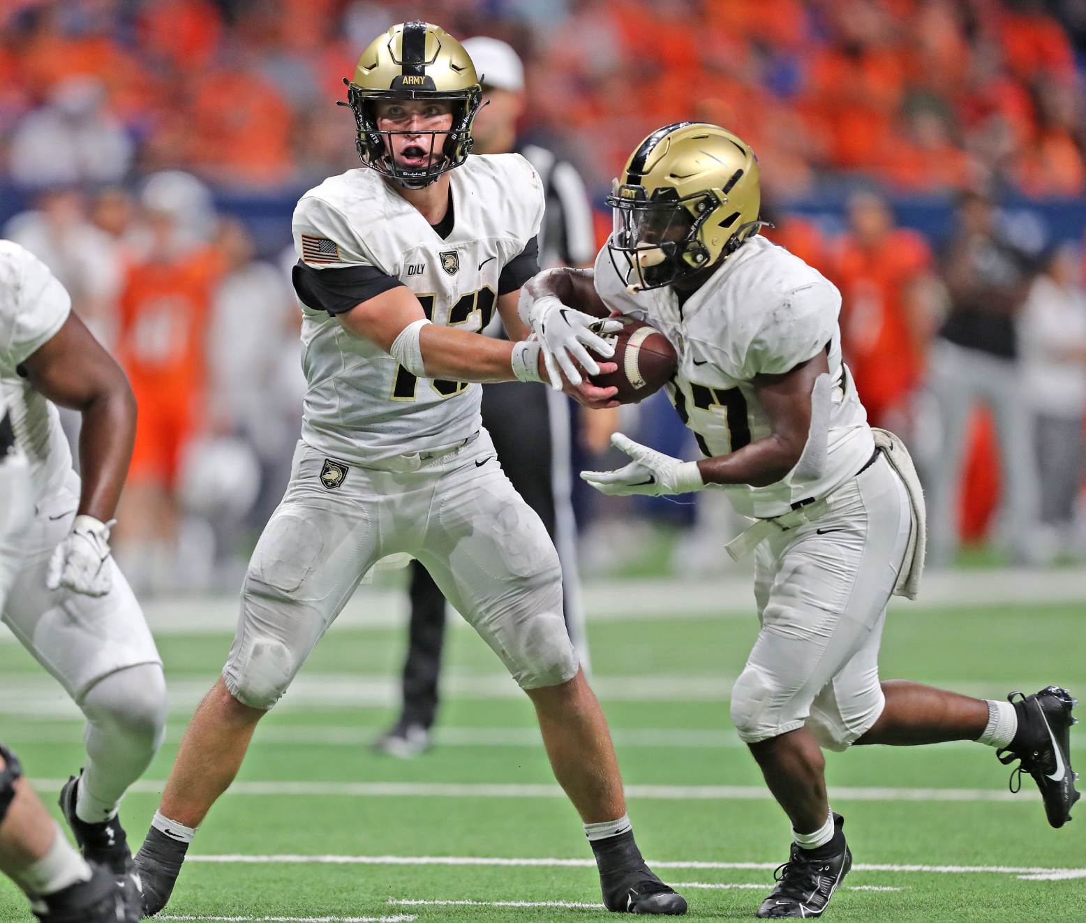 Sep 15, 2023; San Antonio, Texas, USA; Army Black Knights quarterback Bryson Daily (13) hands off the ball to running back Markel Johnson (27) during the second half against the UTSA Roadrunners at the Alamodome. Credit: Danny Wild-USA TODAY Sports