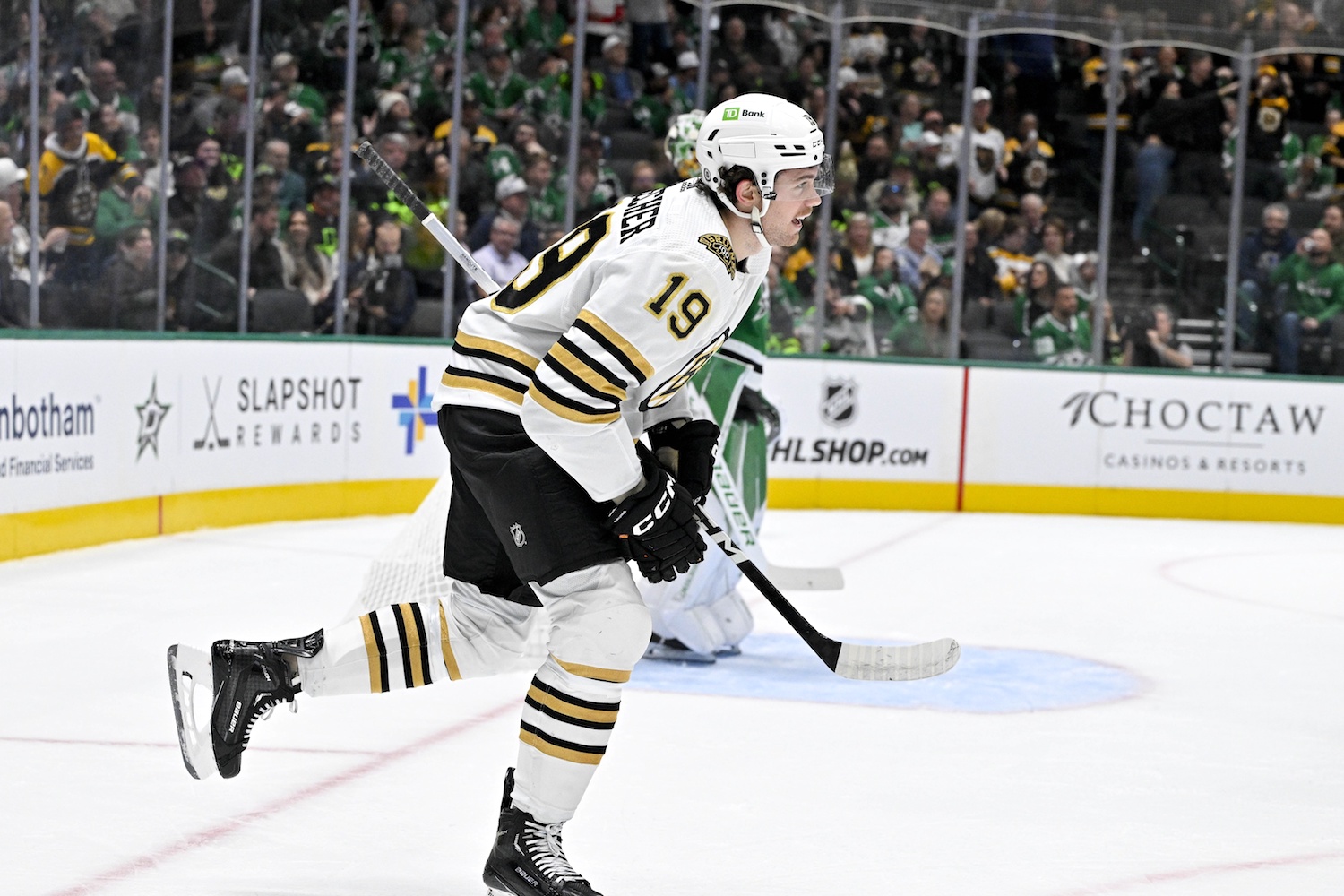 Nov 6, 2023; Dallas, Texas, USA; Boston Bruins center Johnny Beecher (19) skates off the ice after scoring a goal against the Dallas Stars during the first period at the American Airlines Center. Mandatory Credit: Jerome Miron-USA TODAY Sports