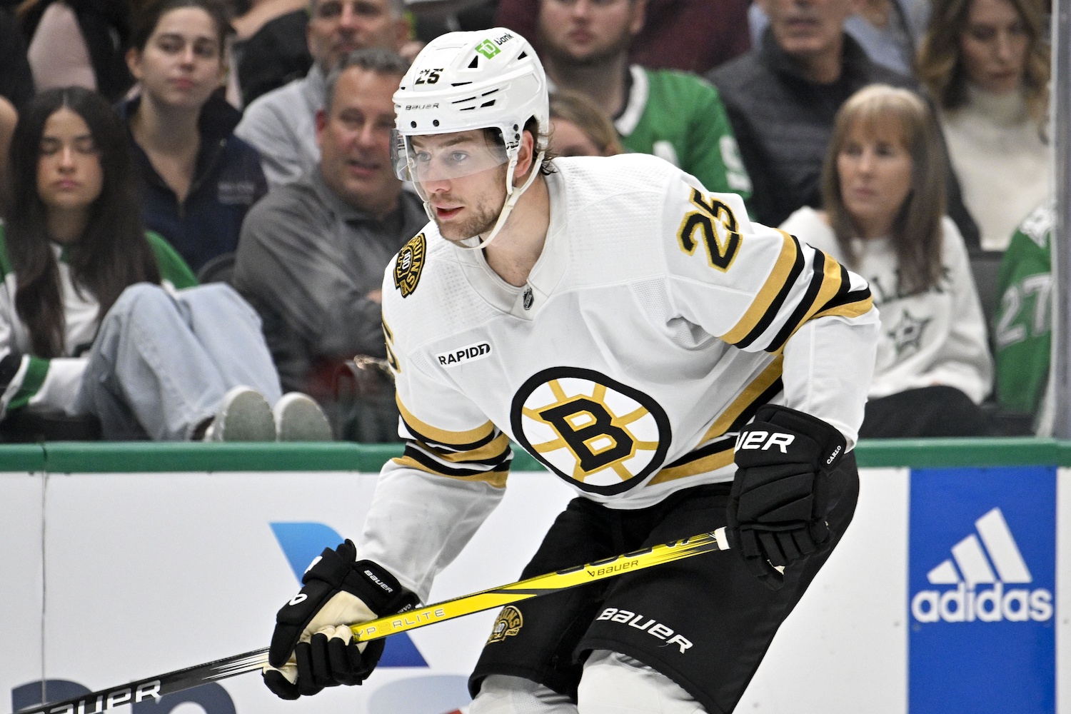 Nov 6, 2023; Dallas, Texas, USA; Boston Bruins defenseman Brandon Carlo (25) in action during the game between the Dallas Stars and the Boston Bruins at the American Airlines Center. Mandatory Credit: Jerome Miron-USA TODAY Sports