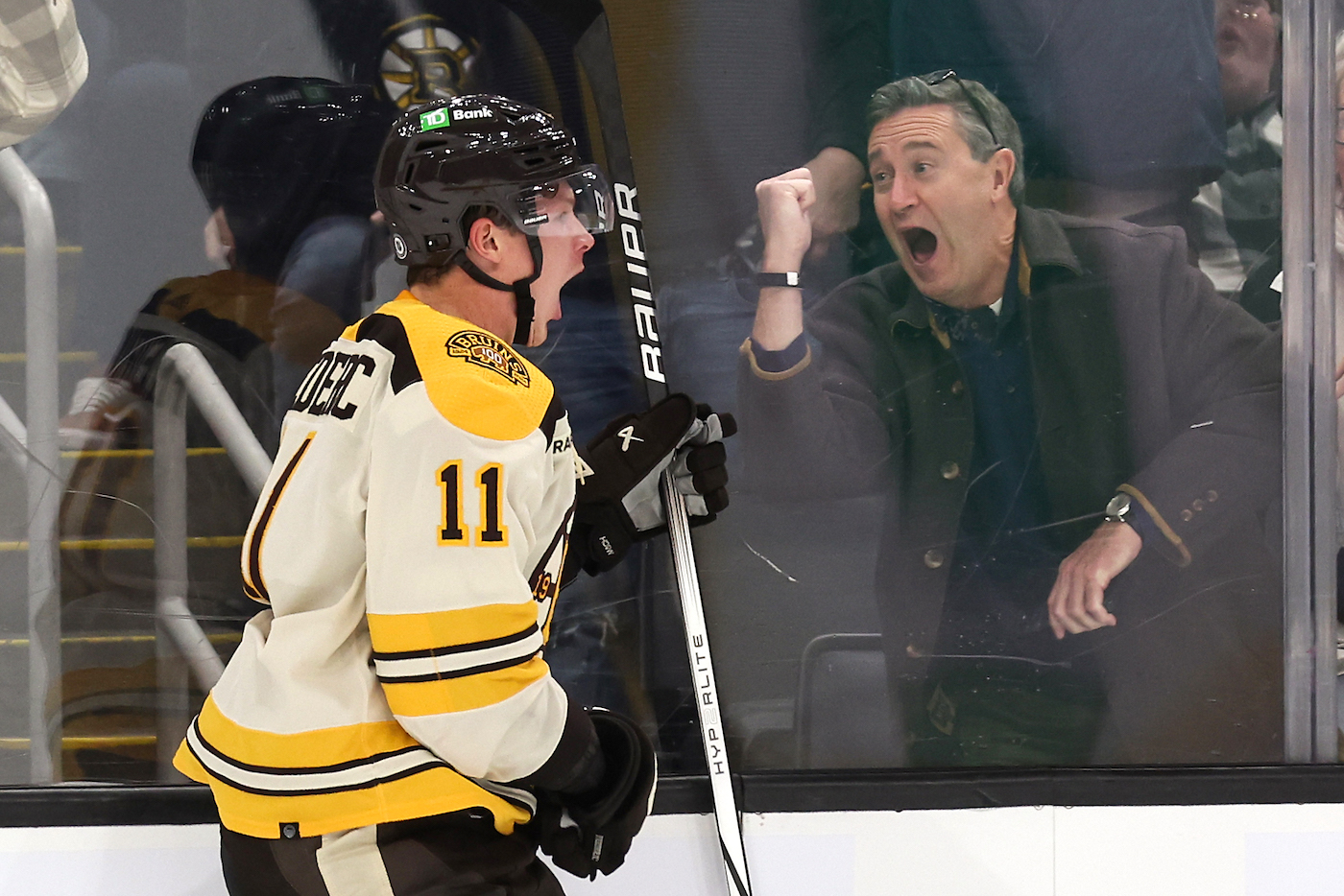 Nov 18, 2023; Boston, Massachusetts, USA; Boston Bruins center Trent Frederic (11) celebrates his goal against the Montreal Canadiens during the second period at TD Garden. Mandatory Credit: Winslow Townson-USA TODAY Sports