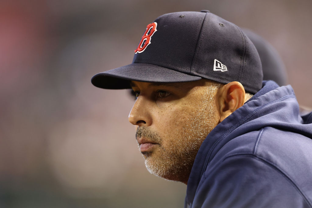 PHOENIX, ARIZONA - MAY 28: Manager Alex Cora #13 of the Boston Red Sox watches from the dugout during the fourth inning of the MLB game against the Arizona Diamondbacks at Chase Field on May 28, 2023 in Phoenix, Arizona. (Photo by Christian Petersen/Getty Images)