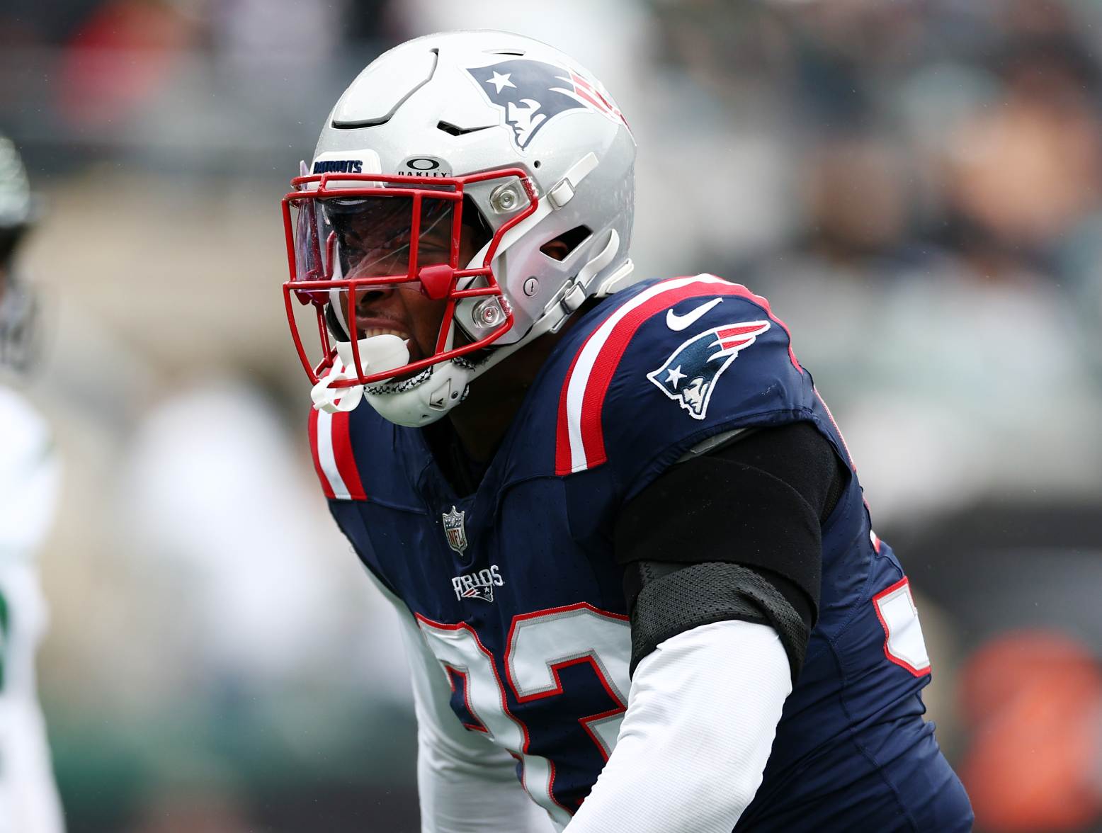 EAST RUTHERFORD, NEW JERSEY - SEPTEMBER 24: Anfernee Jennings #33 of the New England Patriots celebrates a stop in the first quarter of a game against the New York Jets at MetLife Stadium on September 24, 2023 in East Rutherford, New Jersey. (Photo by Elsa/Getty Images)
