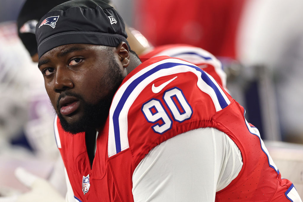 FOXBOROUGH, MASSACHUSETTS - SEPTEMBER 17: Christian Barmore #90 of the New England Patriots looks on from the bench during the game against the Miami Dolphins at Gillette Stadium on September 17, 2023 in Foxborough, Massachusetts. (Photo by Maddie Meyer/Getty Images)