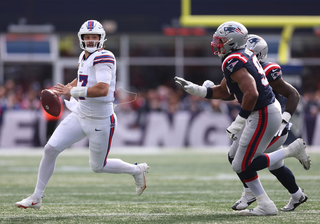 FOXBOROUGH, MASSACHUSETTS - OCTOBER 22: Josh Allen #17 of the Buffalo Bills looks to pass the ball in the first half of the game against the New England Patriots at Gillette Stadium on October 22, 2023 in Foxborough, Massachusetts. (Photo by Maddie Meyer/Getty Images)