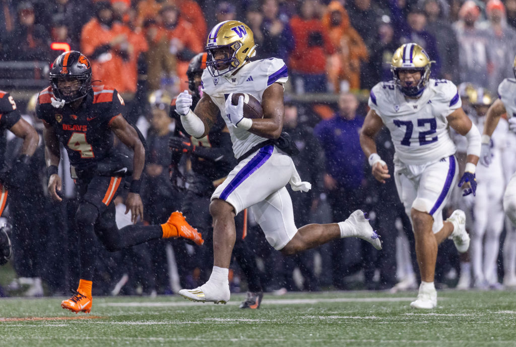 CORVALLIS, OREGON - NOVEMBER 18: Running back Dillon Johnson #7 of the Washington Huskies runs with the ball against the Oregon State Beavers sat Reser Stadium on November 18, 2023 in Corvallis, Oregon. (Photo by Tom Hauck/Getty Images)