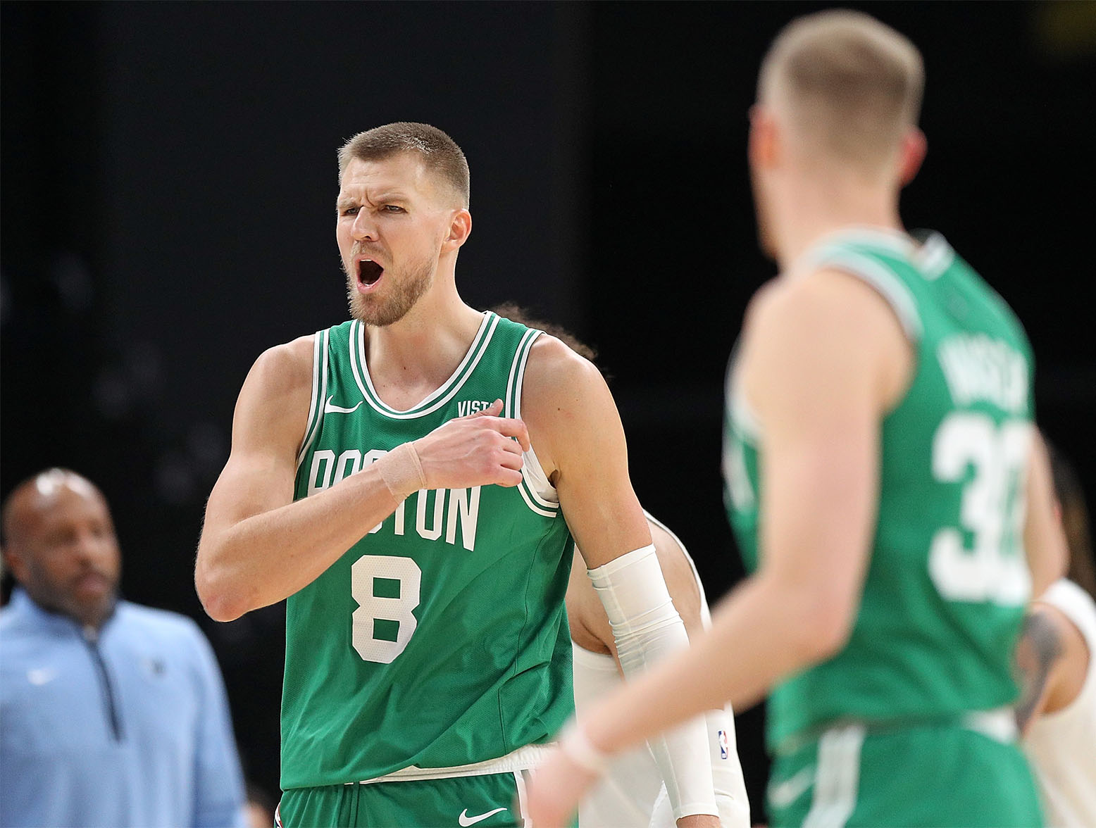 MEMPHIS, TENNESSEE - NOVEMBER 19: Kristaps Porzingis #8 of the Boston Celtics reacts during the second half against the Memphis Grizzlies at FedExForum on November 19, 2023 in Memphis, Tennessee. NOTE TO USER: User expressly acknowledges and agrees that, by downloading and or using this photograph, User is consenting to the terms and conditions of the Getty Images License Agreement. (Photo by Justin Ford/Getty Images)