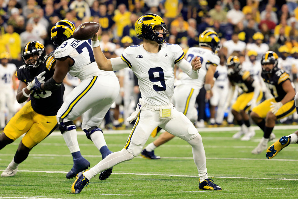 INDIANAPOLIS, INDIANA - DECEMBER 02: J.J. McCarthy #9 of the Michigan Wolverines throws a pass during the second half in the game against the Iowa Hawkeyes during the Big Ten Championship at Lucas Oil Stadium on December 02, 2023 in Indianapolis, Indiana. (Photo by Justin Casterline/Getty Images)