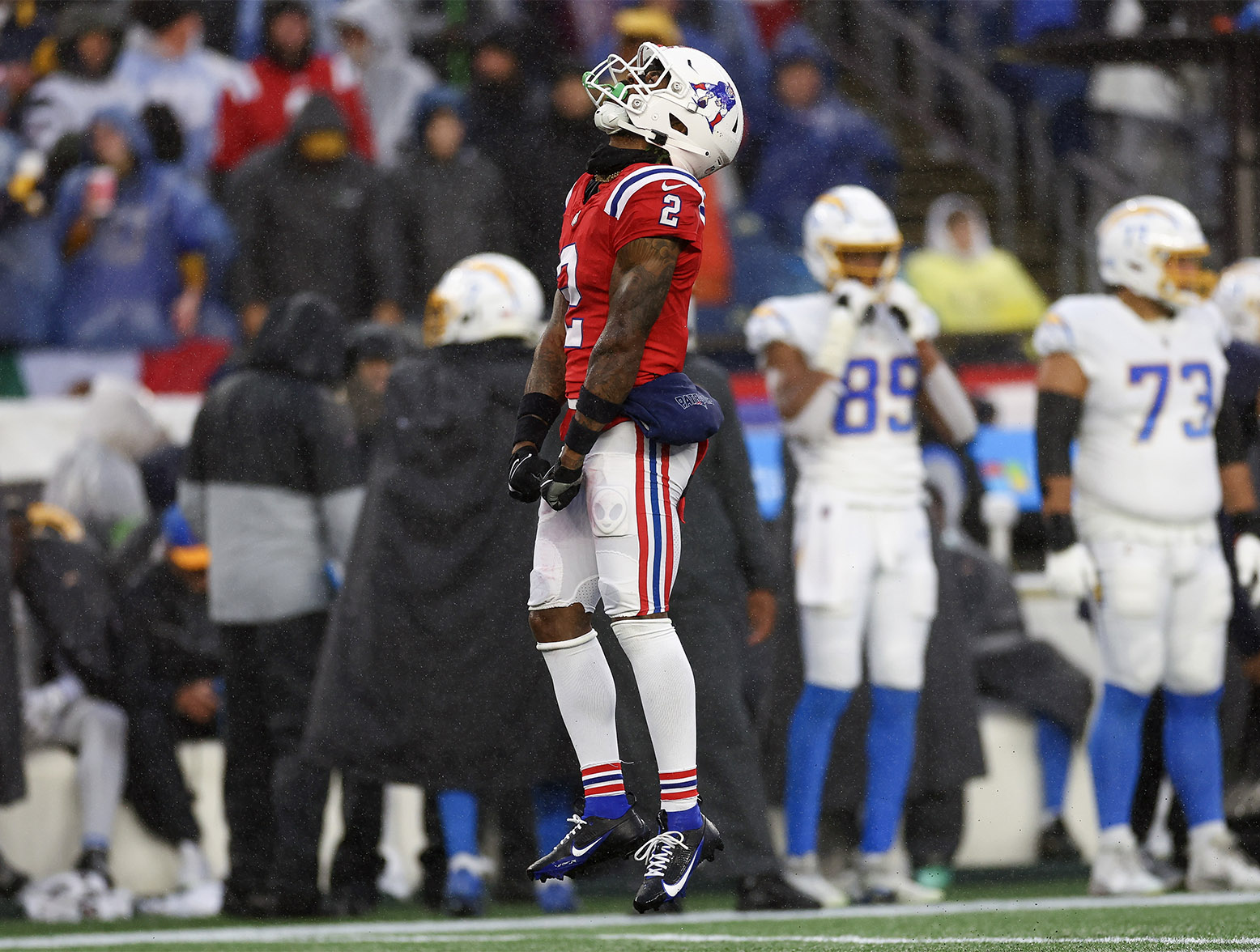 FOXBOROUGH, MASSACHUSETTS - DECEMBER 03: Jalen Mills #2 of the New England Patriots celebrates in the fourth quarter against the Los Angeles Chargers at Gillette Stadium on December 03, 2023 in Foxborough, Massachusetts. (Photo by Maddie Meyer/Getty Images)