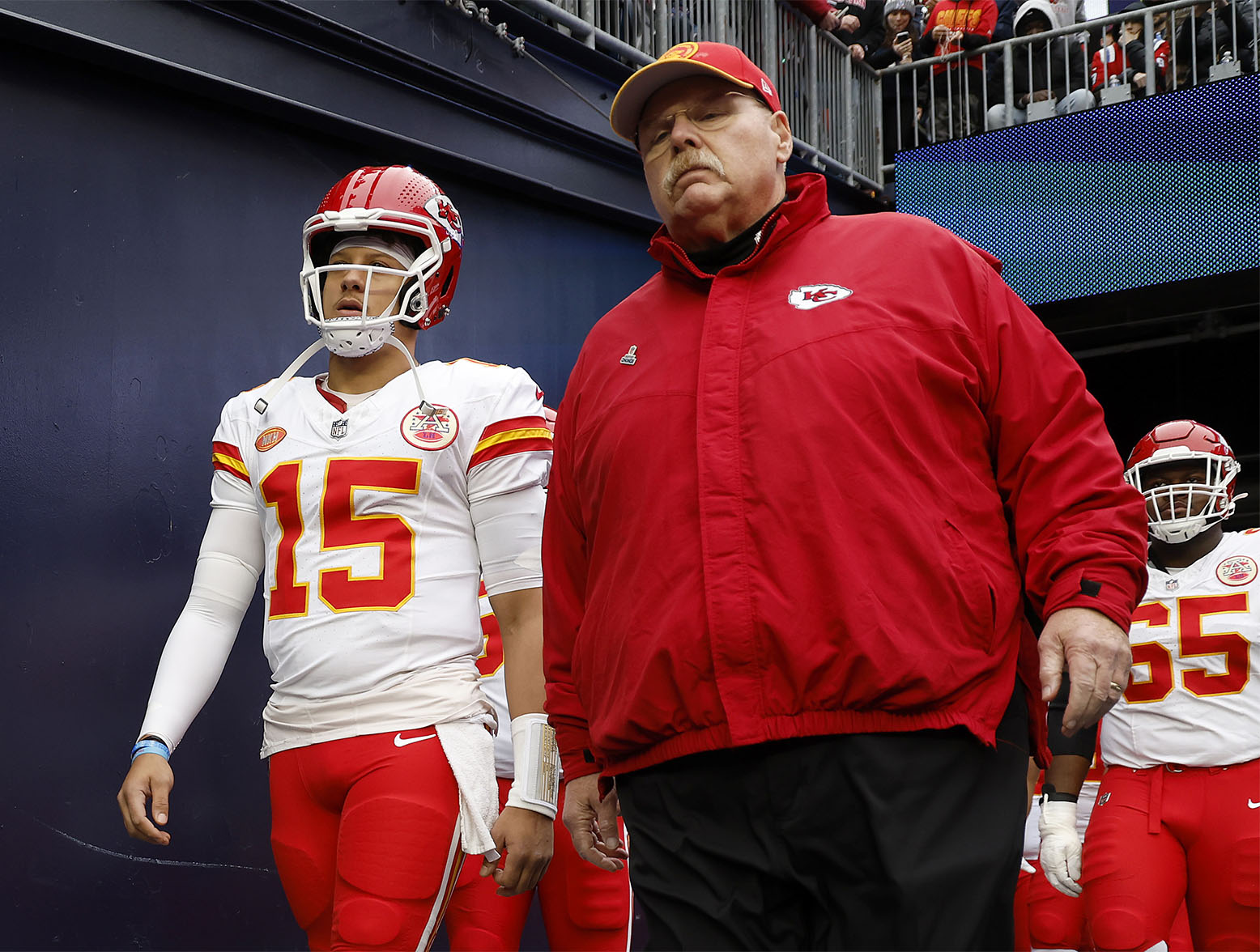 FOXBOROUGH, MASSACHUSETTS - DECEMBER 17: Patrick Mahomes #15 of the Kansas City Chiefs and head coach Andy Reid of the Kansas City Chiefs walk onto the field prior to a game against the New England Patriots at Gillette Stadium on December 17, 2023 in Foxborough, Massachusetts. (Photo by Sarah Stier/Getty Images)