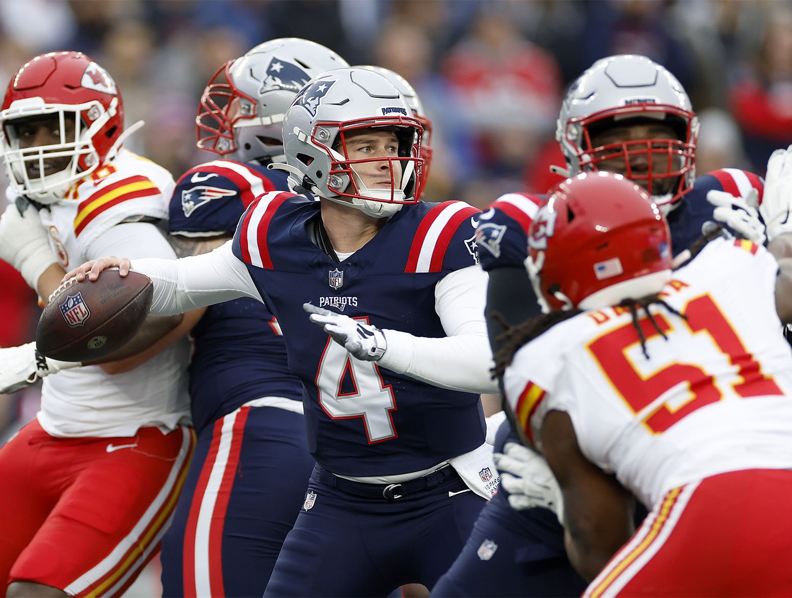 FOXBOROUGH, MASSACHUSETTS - DECEMBER 17: Bailey Zappe #4 of the New England Patriots attempts a pass during the first quarter against the Kansas City Chiefs at Gillette Stadium on December 17, 2023 in Foxborough, Massachusetts. (Photo by Sarah Stier/Getty Images)