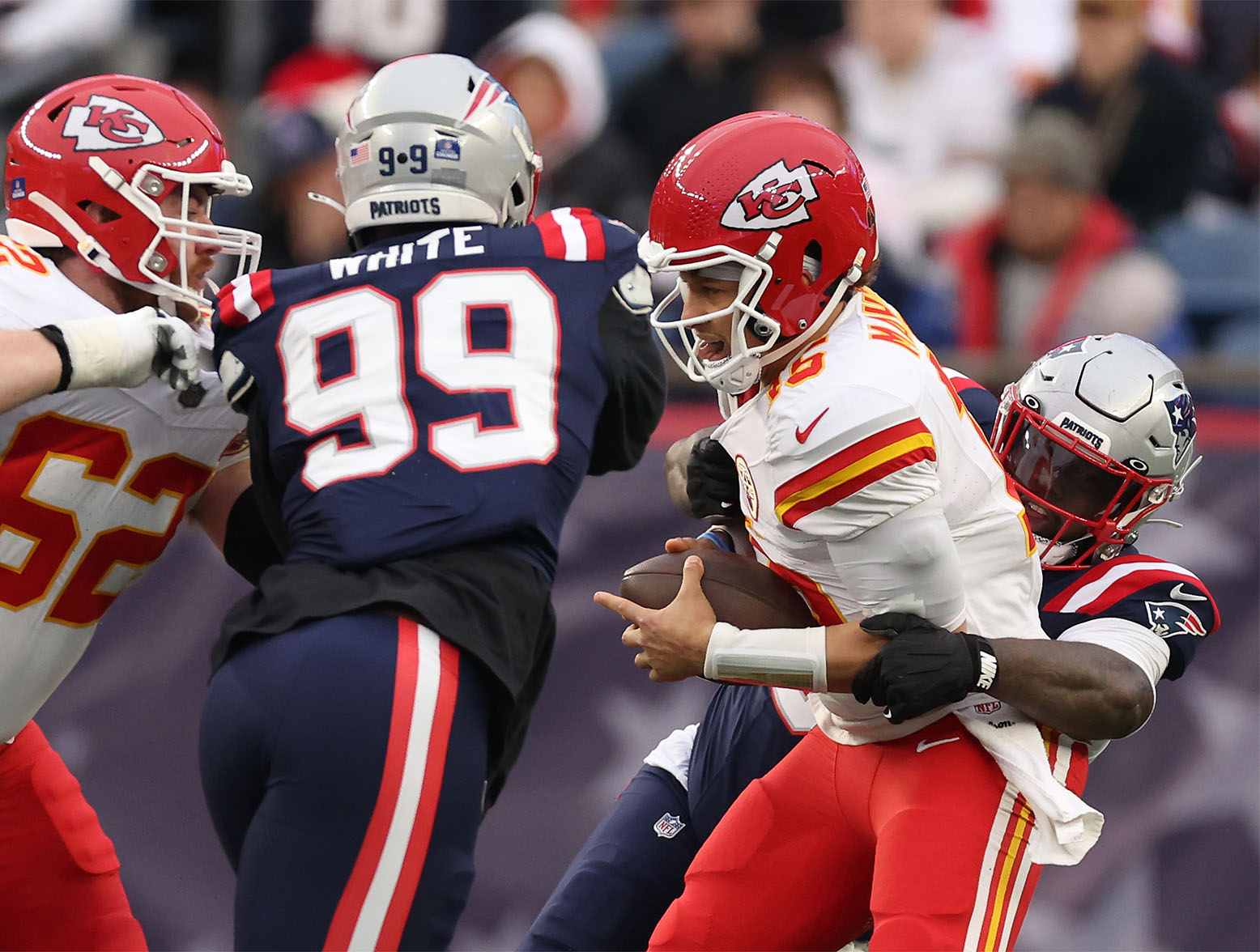 FOXBOROUGH, MASSACHUSETTS - DECEMBER 17: Christian Barmore #90 of the New England Patriots sacks Patrick Mahomes #15 of the Kansas City Chiefs during the second quarter at Gillette Stadium on December 17, 2023 in Foxborough, Massachusetts. (Photo by Maddie Meyer/Getty Images)