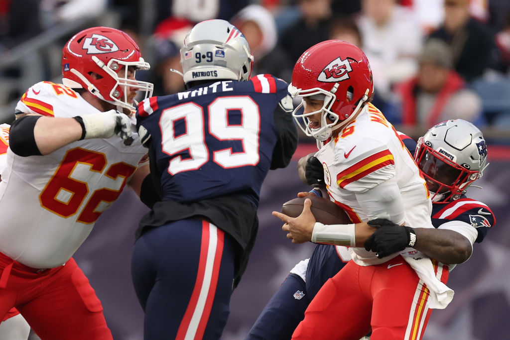 FOXBOROUGH, MASSACHUSETTS - DECEMBER 17: Christian Barmore #90 of the New England Patriots sacks Patrick Mahomes #15 of the Kansas City Chiefs during the second quarter at Gillette Stadium on December 17, 2023 in Foxborough, Massachusetts. (Photo by Maddie Meyer/Getty Images)