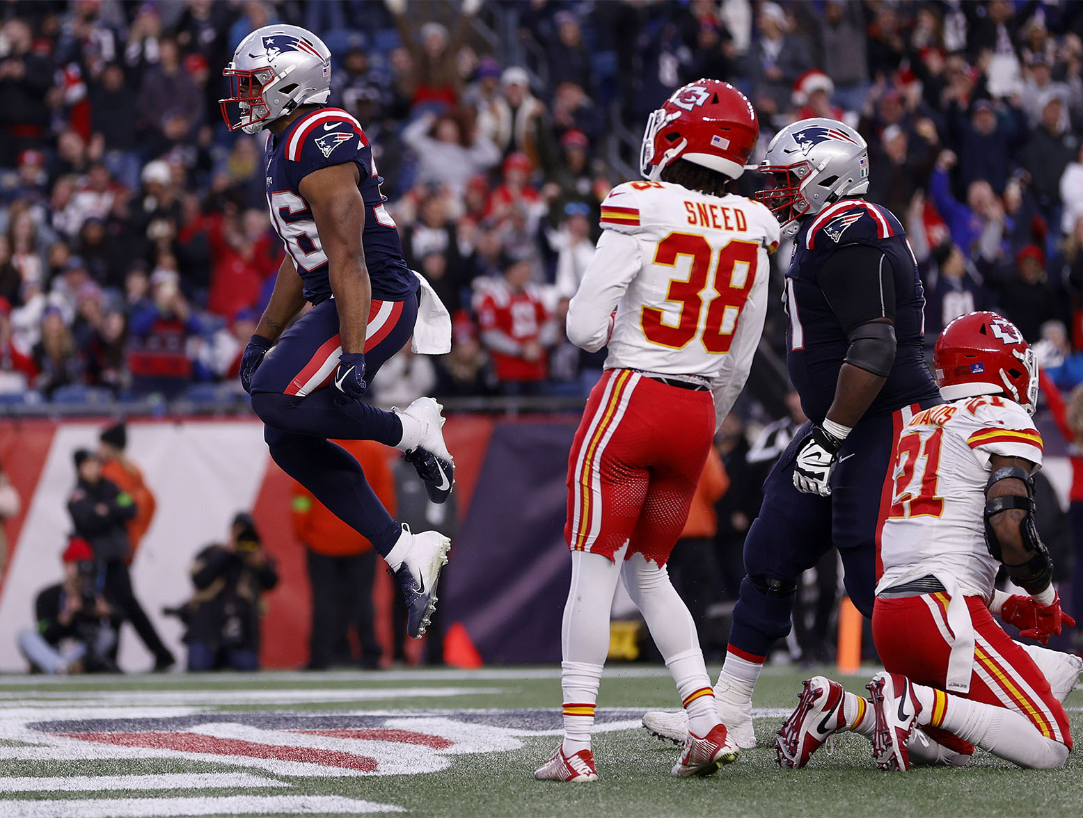 FOXBOROUGH, MASSACHUSETTS - DECEMBER 17: Kevin Harris #36 of the New England Patriots celebrates after scoring a rushing touchdown against the Kansas City Chiefs during the fourth quarter at Gillette Stadium on December 17, 2023 in Foxborough, Massachusetts. (Photo by Sarah Stier/Getty Images)