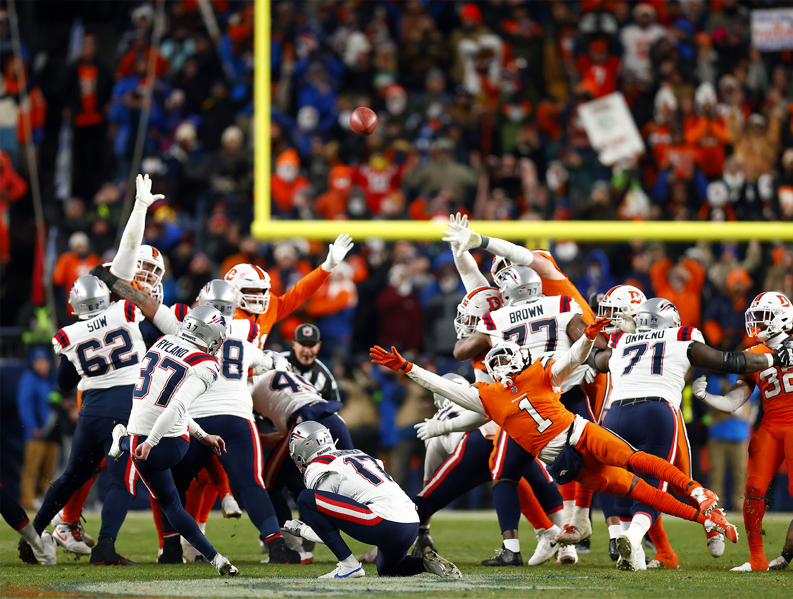 DENVER, COLORADO - DECEMBER 24: Place kicker Chad Ryland #37 of the New England Patriots kicks a field goal late in the 4th quarter during the game against the Denver Broncos at Empower Field At Mile High on December 24, 2023 in Denver, Colorado. (Photo by Justin Edmonds/Getty Images)