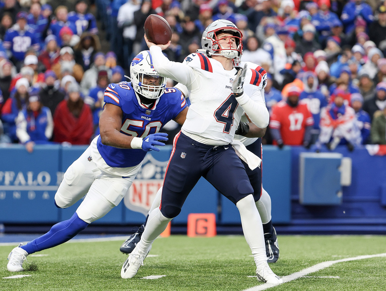 ORCHARD PARK, NEW YORK - DECEMBER 31: Bailey Zappe #4 of the New England Patriots throws a pass during the second quarter of a game against the Buffalo Bills at Highmark Stadium on December 31, 2023 in Orchard Park, New York. (Photo by Timothy T Ludwig/Getty Images)