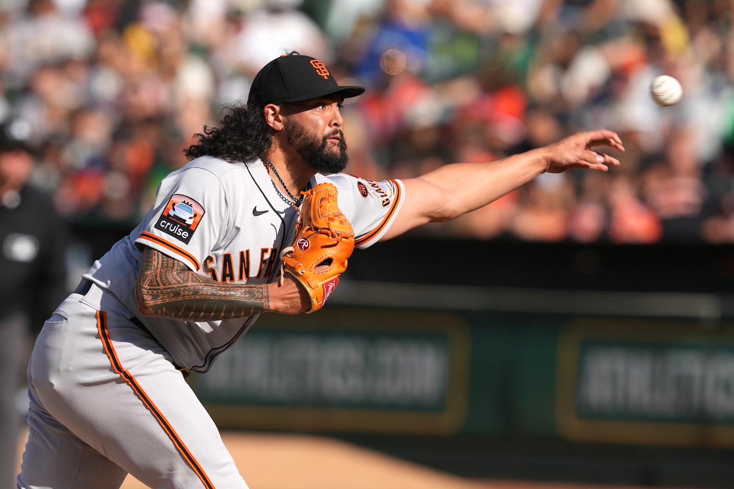 Aug 5, 2023; Oakland, California, USA; San Francisco Giants relief pitcher Sean Manaea (52) throws a pitch against the Oakland Athletics during the sixth inning at Oakland-Alameda County Coliseum. Mandatory Credit: Darren Yamashita-USA TODAY Sports