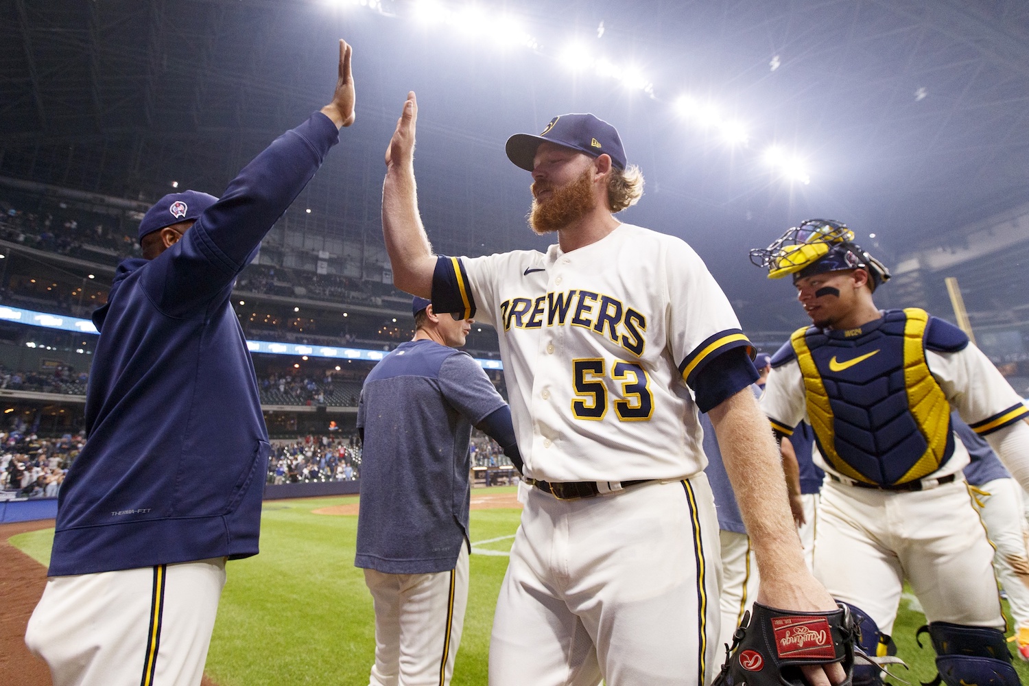Sep 11, 2023; Milwaukee, Wisconsin, USA; Milwaukee Brewers pitcher Brandon Woodruff (53) high fives teammates following the game against the Miami Marlins at American Family Field. Mandatory Credit: Jeff Hanisch-USA TODAY Sports