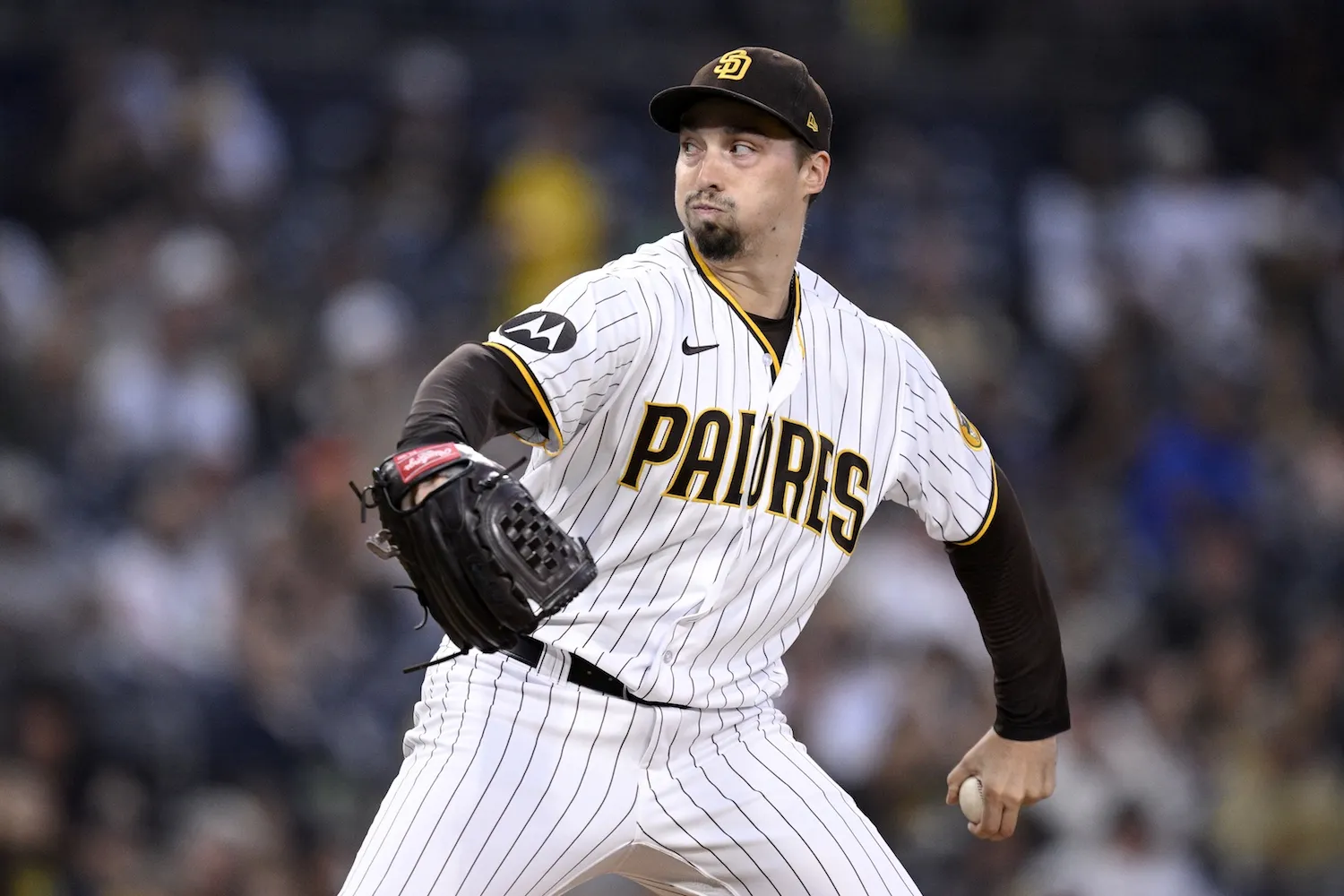 Sep 19, 2023; San Diego, California, USA; San Diego Padres starting pitcher Blake Snell (4) throws a pitch against the Colorado Rockies during the first inning at Petco Park. Mandatory Credit: Orlando Ramirez-USA TODAY Sports