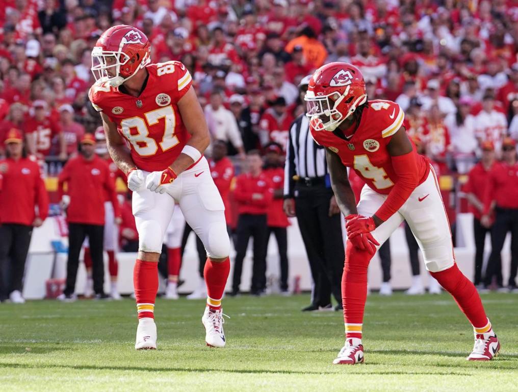 Oct 12, 2023; Kansas City, Missouri, USA; Kansas City Chiefs tight end Travis Kelce (87) and wide receiver Rashee Rice (4) line up against the Los Angeles Chargers during the game at GEHA Field at Arrowhead Stadium. Credit: Denny Medley-USA TODAY Sports