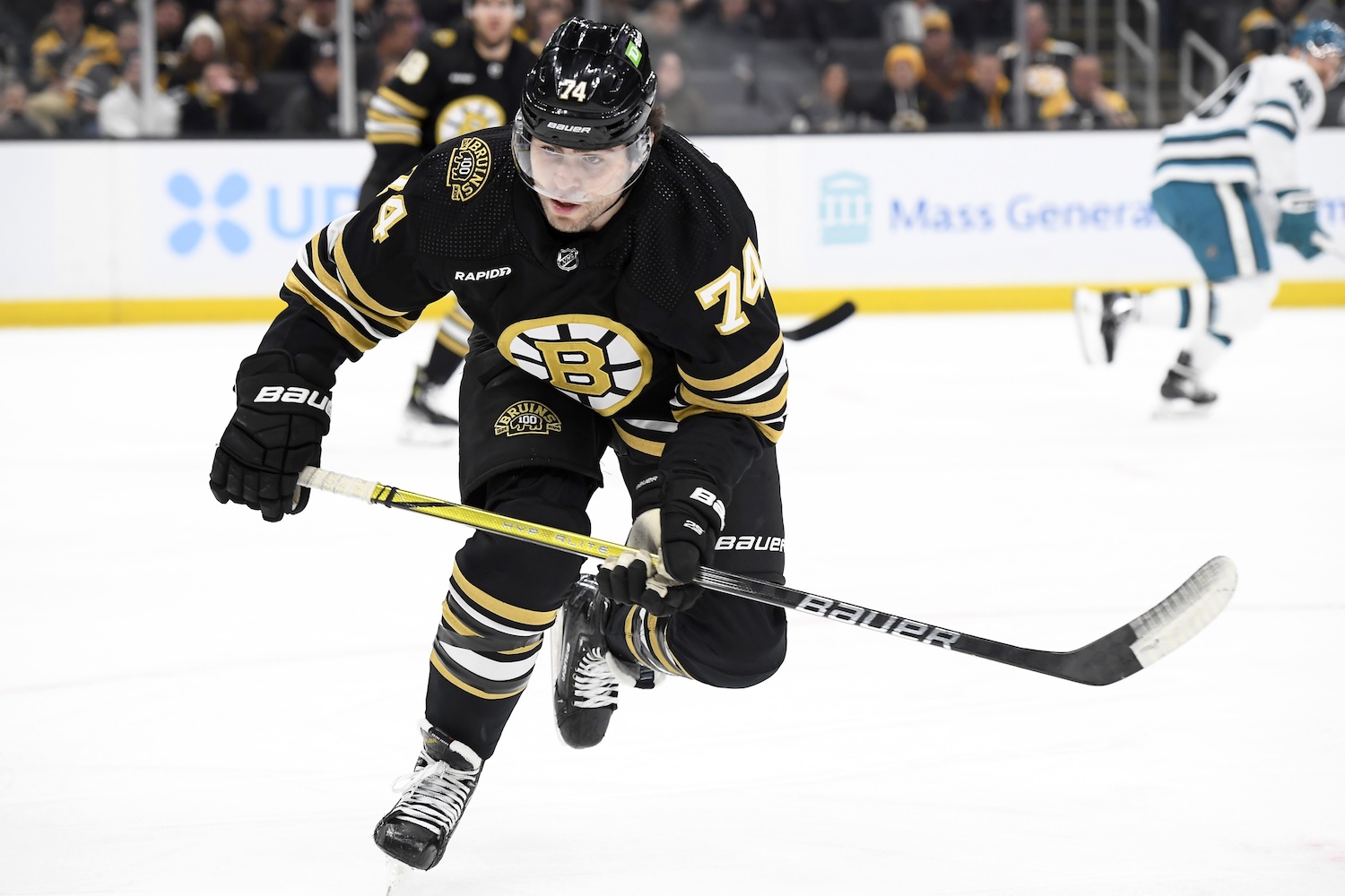 Nov 30, 2023; Boston, Massachusetts, USA; Boston Bruins left wing Jake DeBrusk (74) skates after the puck during the first period against the San Jose Sharks at TD Garden. Mandatory Credit: Bob DeChiara-USA TODAY Sports