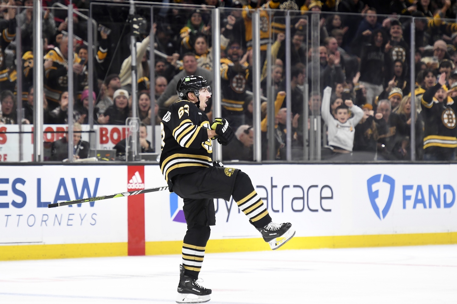 Dec 3, 2023; Boston, Massachusetts, USA; Boston Bruins left wing Brad Marchand (63) celebrates scoring a goal during the third period against the Columbus Blue Jackets at TD Garden. Mandatory Credit: Bob DeChiara-USA TODAY Sports