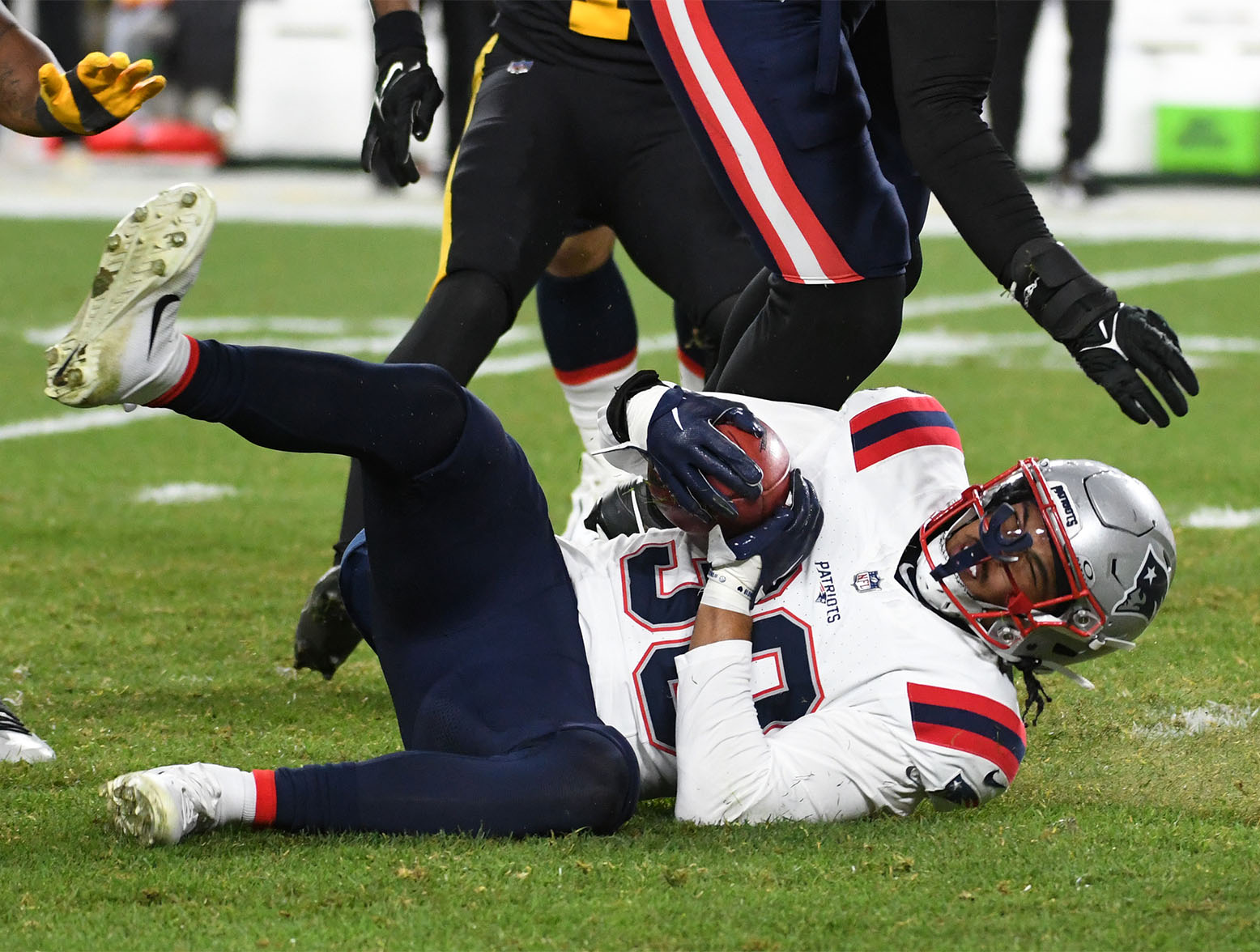 Dec 7, 2023; Pittsburgh, Pennsylvania, USA; New England Patriots special teams player Marte Mapu (30) recovers a blocked punt against the Pittsburgh Steelers during the fourth quarter at Acrisure Stadium. Mandatory Credit: Philip G. Pavely-USA TODAY Sports