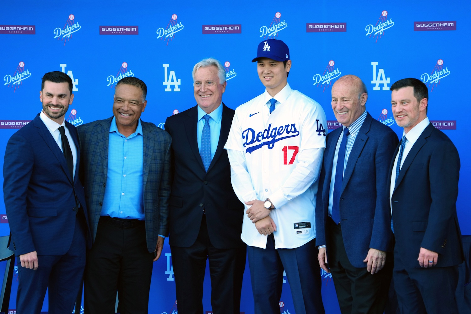 Dec 14, 2023; Los Angeles, CA, USA; From left Brandon Gomes, Dave Roberts, Mark Walter, Shohei Ohtani, Stan Kasten and Andrew Friedman pose for a photo at Ohtani's introductory press conference at Dodger Stadium. Mandatory Credit: Kirby Lee-USA TODAY Sports