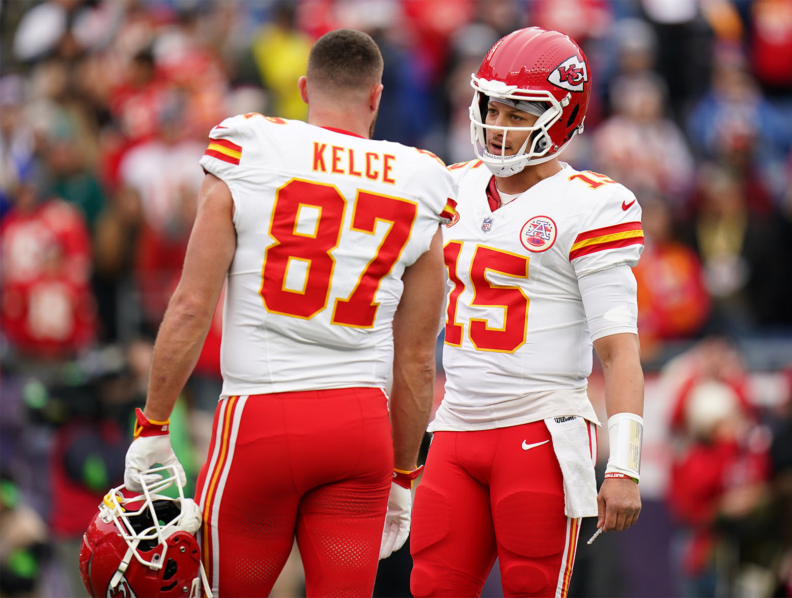 Dec 17, 2023; Foxborough, Massachusetts, USA; Kansas City Chiefs quarterback Patrick Mahomes (15) and tight end Travis Kelce (87) warm up before the game against the New England Patriots at Gillette Stadium. Mandatory Credit: David Butler II-USA TODAY Sports