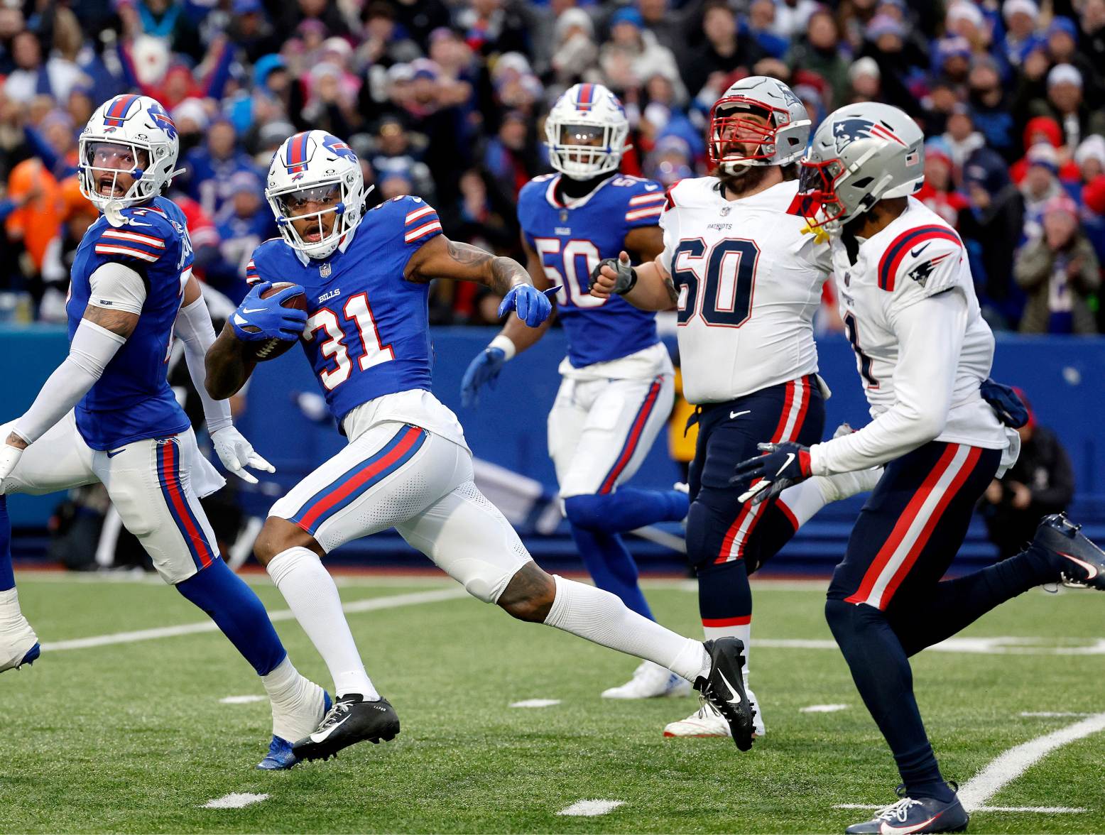 Buffalo Bills cornerback Rasul Douglas (31) scores on this interception against New England. It was Douglas’s second interception of the game. The Bills beat the Patriots 27-21. (Jamie Germano/Rochester Democrat and Chronicle/USA Today Network)