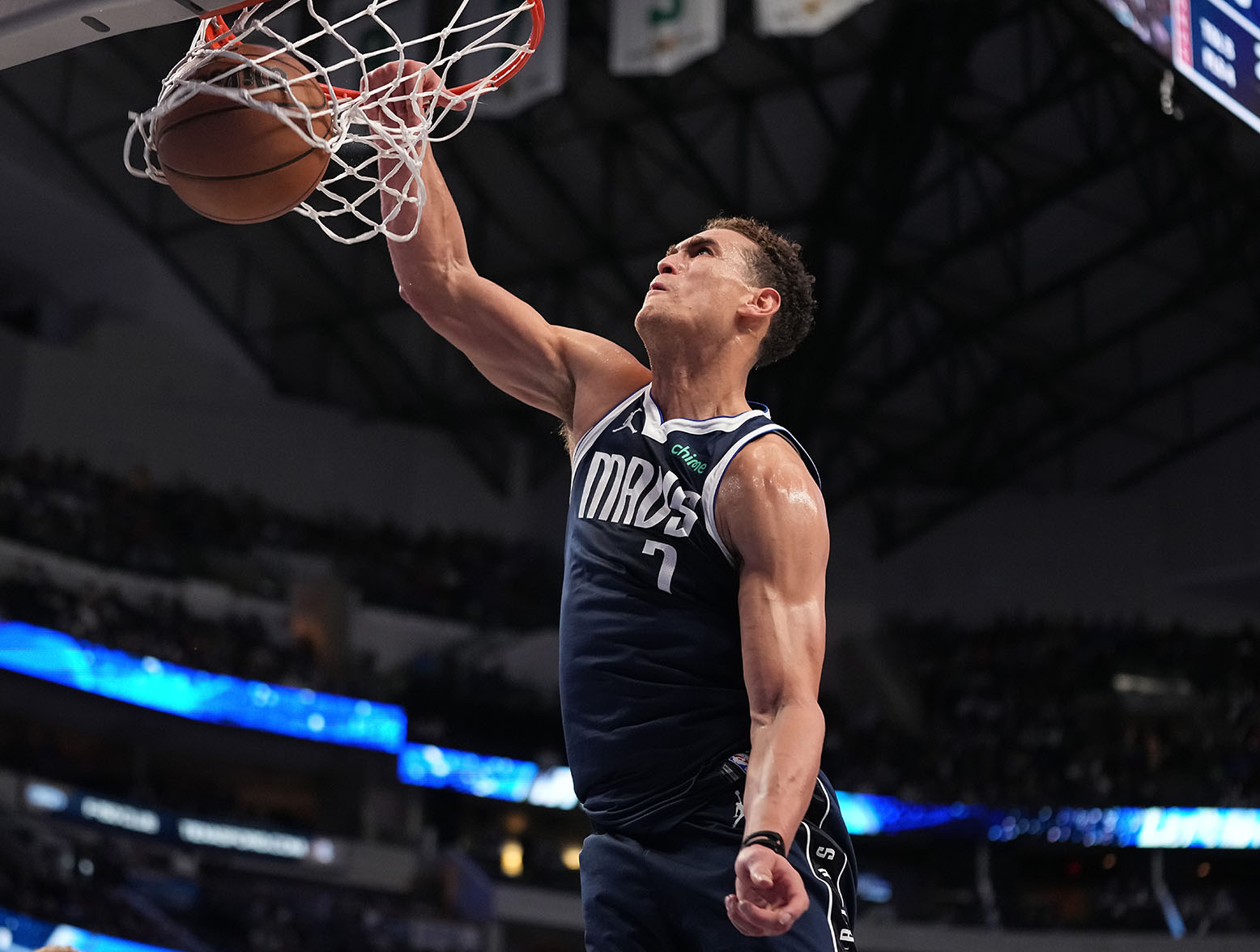 DALLAS, TEXAS - DECEMBER 23: Dwight Powell #7 of the Dallas Mavericks dunks during the second half against the San Antonio Spurs at American Airlines Center on December 23, 2023 in Dallas, Texas. (Photo by Sam Hodde/Getty Images)
