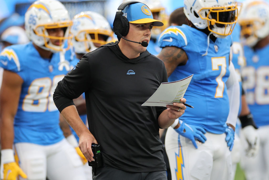 INGLEWOOD, CALIFORNIA - OCTOBER 01: Offensive coordinator Kellen Moore of the Los Angeles Chargers looks on against the Las Vegas Raiders during the first half at SoFi Stadium on October 01, 2023 in Inglewood, California. (Photo by Kevork Djansezian/Getty Images)
