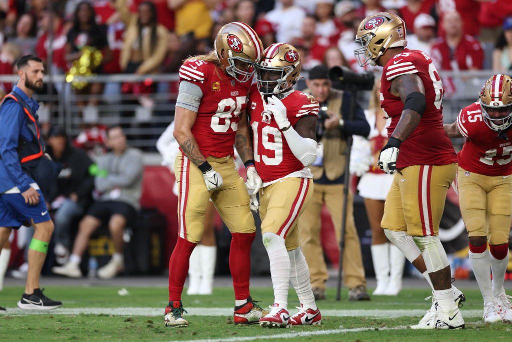 GLENDALE, ARIZONA - DECEMBER 17: Deebo Samuel #19 of the San Francisco 49ers and George Kittle #85 of the San Francisco 49ers react during the fourth quarter of a game against the Arizona Cardinals at State Farm Stadium on December 17, 2023 in Glendale, Arizona. (Photo by Christian Petersen/Getty Images)