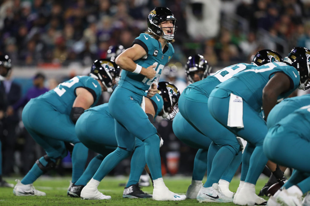 JACKSONVILLE, FLORIDA - DECEMBER 17: Trevor Lawrence #16 of the Jacksonville Jaguars signals a play against the Baltimore Ravens during the first quarter at EverBank Stadium on December 17, 2023 in Jacksonville, Florida. (Photo by Courtney Culbreath/Getty Images)