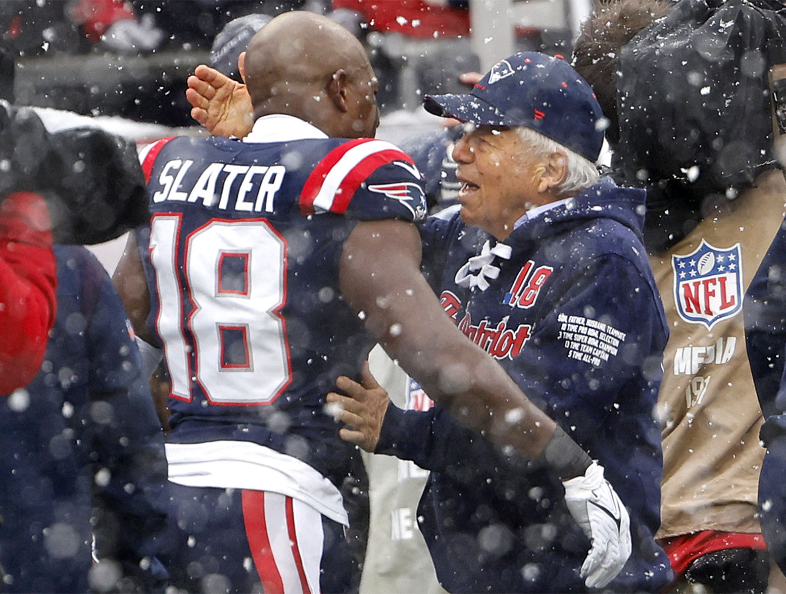 FOXBOROUGH, MASSACHUSETTS - JANUARY 07: Matthew Slater #18 of the New England Patriots and CEO of the New England Patriots Robert Kraft speak before the game at Gillette Stadium on January 07, 2024 in Foxborough, Massachusetts. (Photo by Winslow Townson/Getty Images)