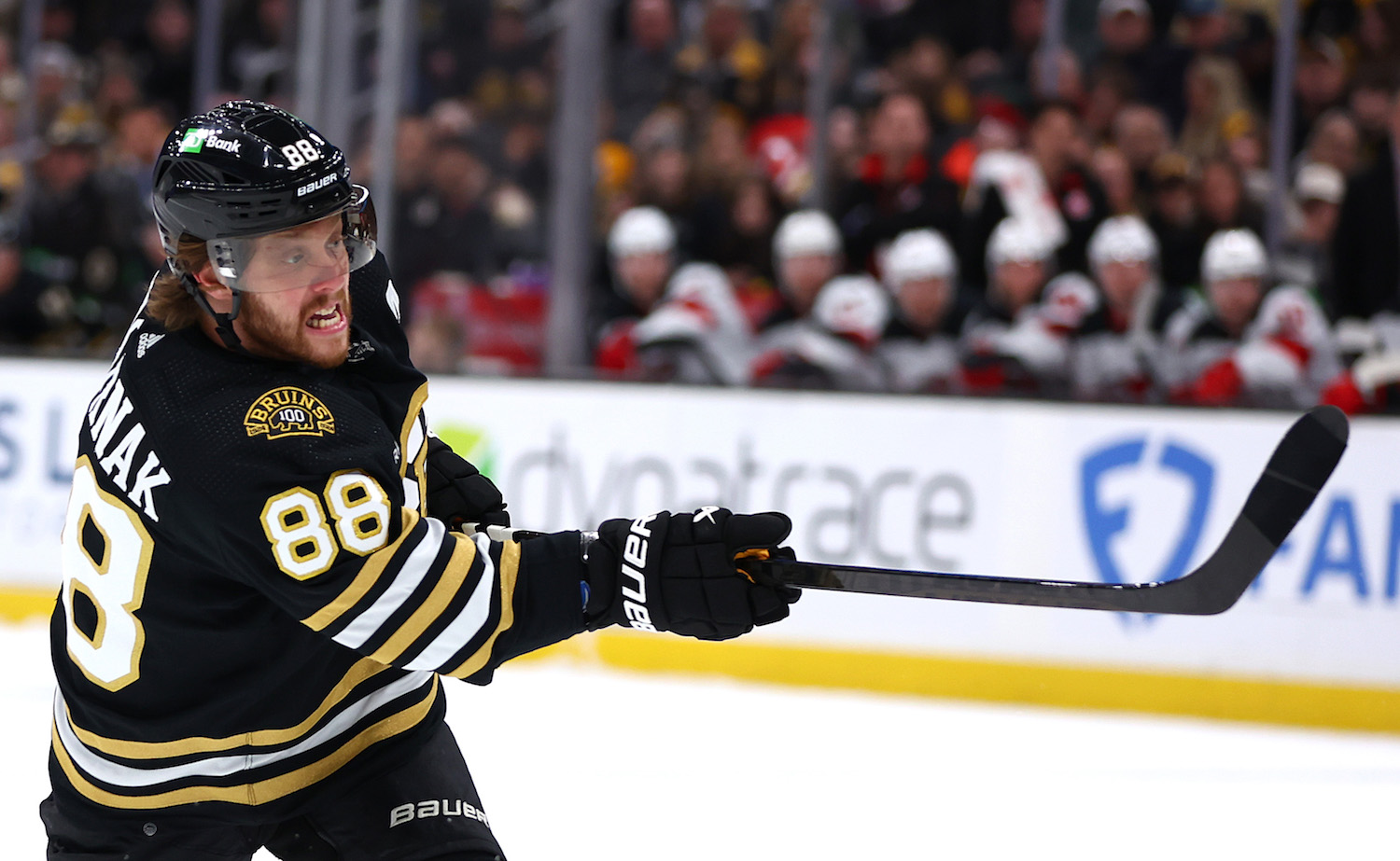 BOSTON, MASSACHUSETTS - JANUARY 15: David Pastrnak #88 of the Boston Bruins takes a shot against the New Jersey Devils during the first period at TD Garden on January 15, 2024 in Boston, Massachusetts. (Photo by Maddie Meyer/Getty Images)