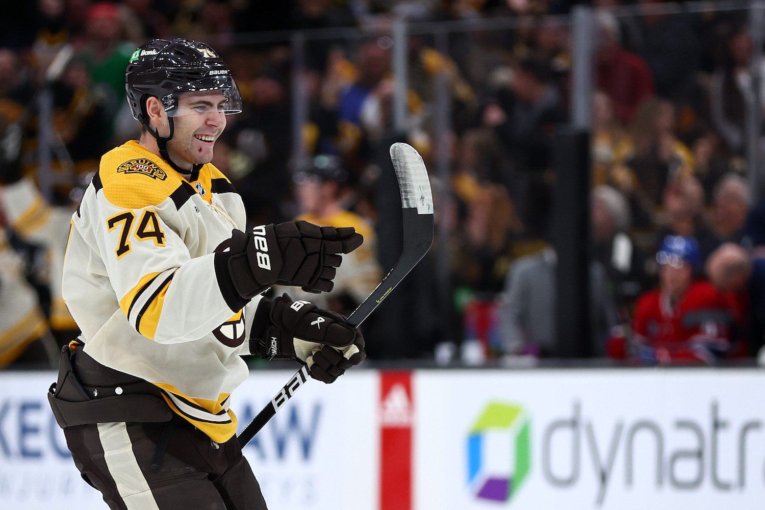 BOSTON, MASSACHUSETTS - JANUARY 20: Jake DeBrusk #74 of the Boston Bruins celebrates after assisting a goal scored by Pavel Zacha #18 against the Montreal Canadiens during the third period at TD Garden on January 20, 2024 in Boston, Massachusetts. The Bruins defeat the Canadiens 9-4. (Photo by Maddie Meyer/Getty Images)