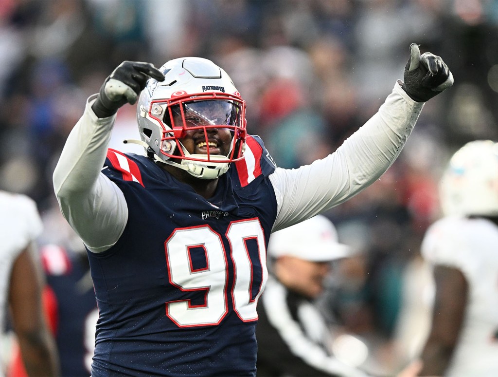 Jan 1, 2023; Foxborough, Massachusetts, USA; New England Patriots defensive tackle Christian Barmore (90) reacts after a sack against the Miami Dolphins during the second half at Gillette Stadium. Mandatory Credit: Brian Fluharty-USA TODAY Sports