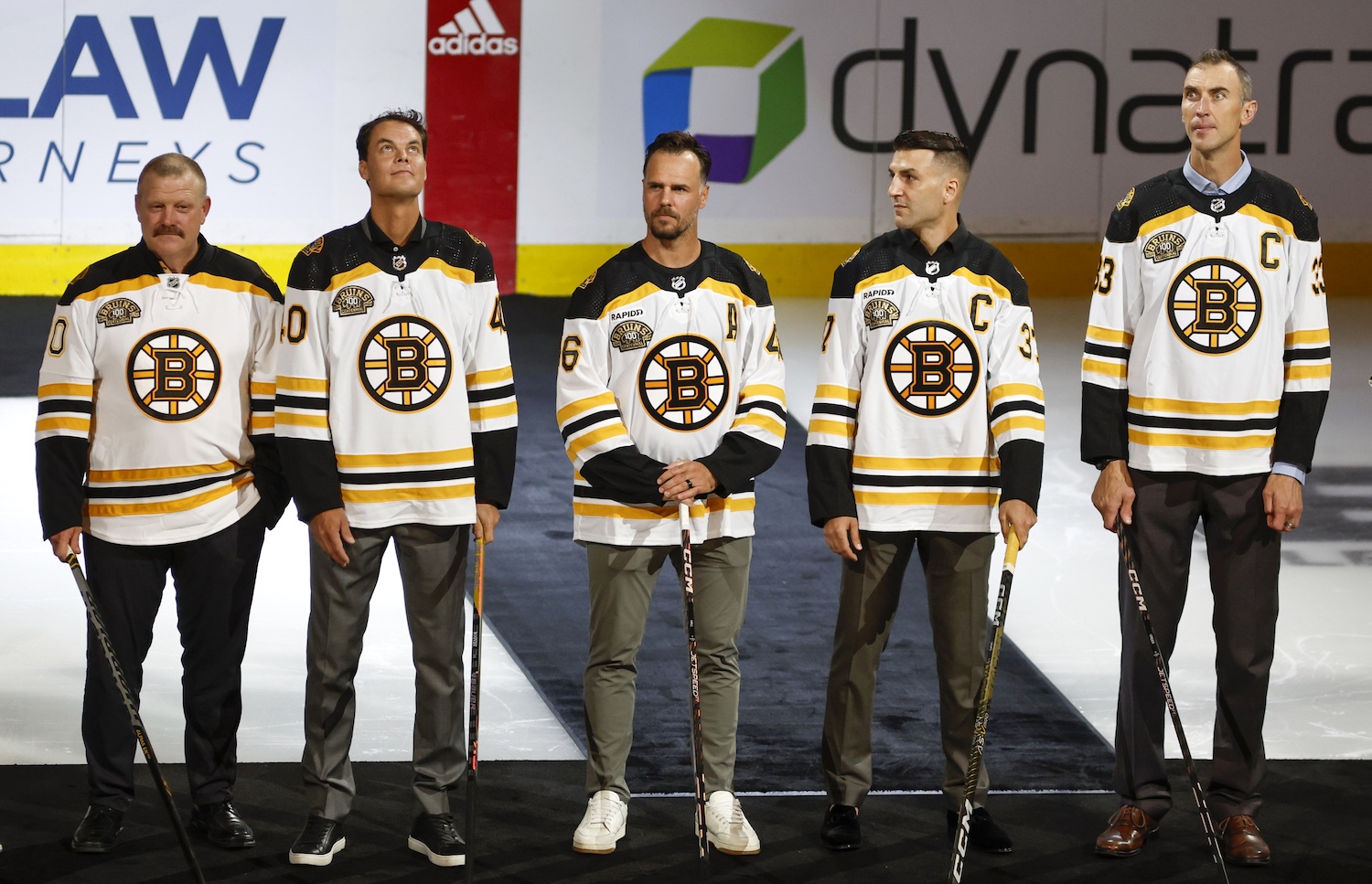 Oct 11, 2023; Boston, Massachusetts, USA; Members of the Boston Bruins 2011 Stanley Cup championship team, from left, Tim Thomas, Tuukka Rask, David Krejci, Patrice Bergeron and Zdeno Chara before the start of Boston’s 100th season in the NHL at TD Garden. Mandatory Credit: Winslow Townson-USA TODAY Sports