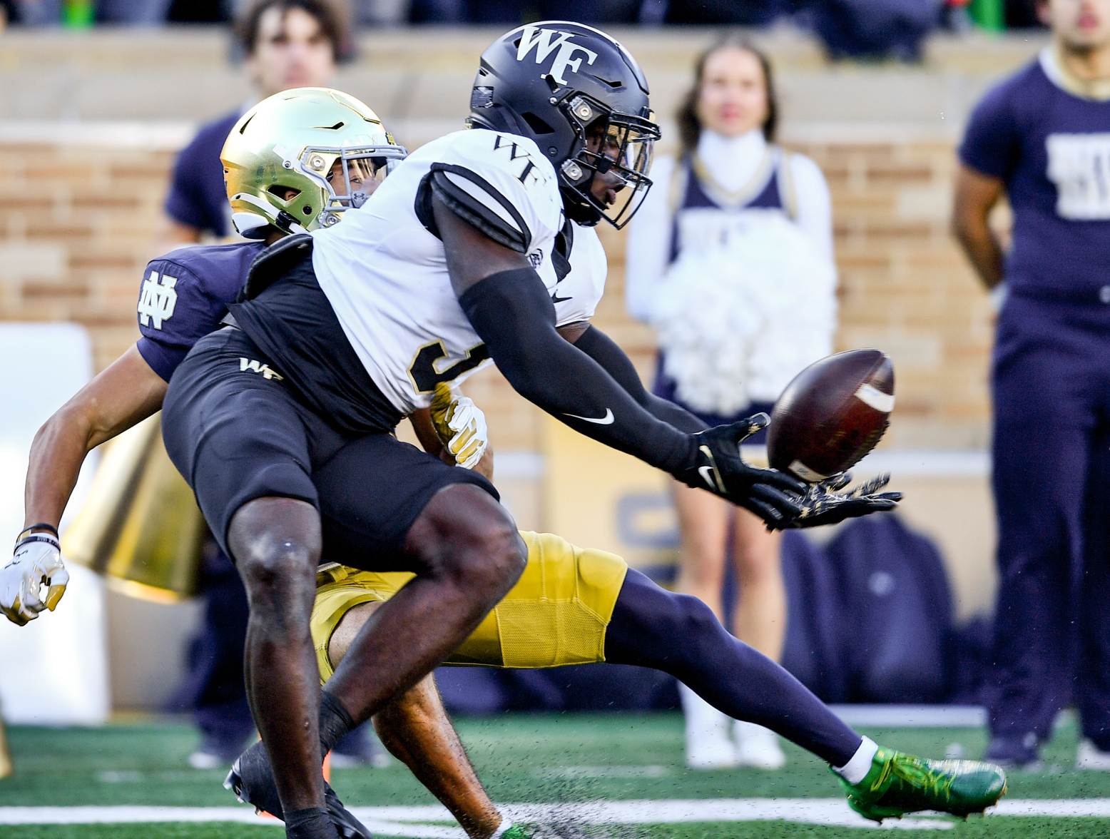 Nov 18, 2023; South Bend, Indiana, USA; Wake Forest Demon Deacons safety Malik Mustapha (3) breaks up a pass intended for Notre Dame Fighting Irish wide receiver Jordan Faison (80) in the first quarter at Notre Dame Stadium. Credit: Matt Cashore-USA TODAY Sports