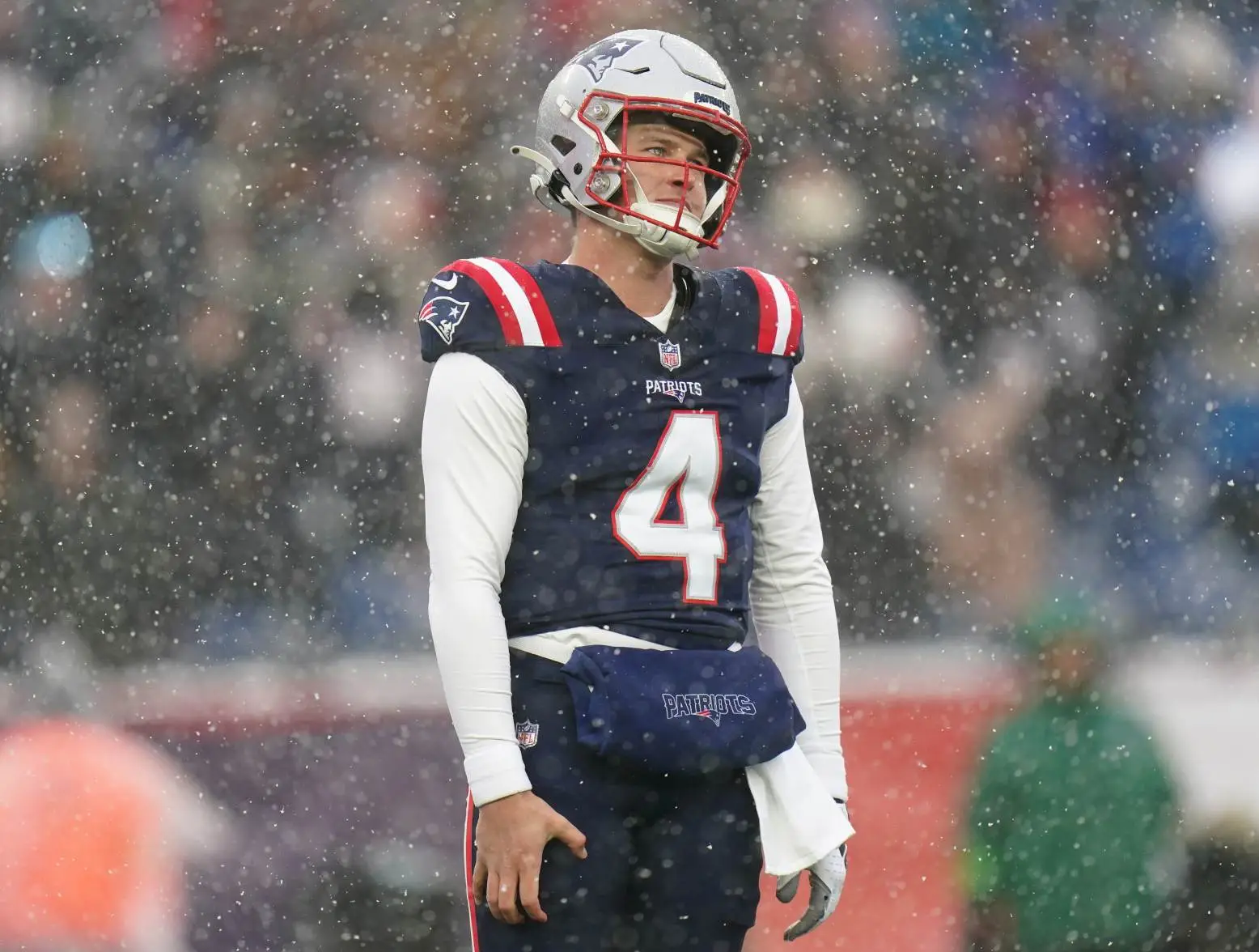 Jan 7, 2024; Foxborough, Massachusetts, USA; New England Patriots quarterback Bailey Zappe (4) reacts after his pass against the New York Jets in the first quarter at Gillette Stadium. Mandatory Credit: David Butler II-USA TODAY Sports