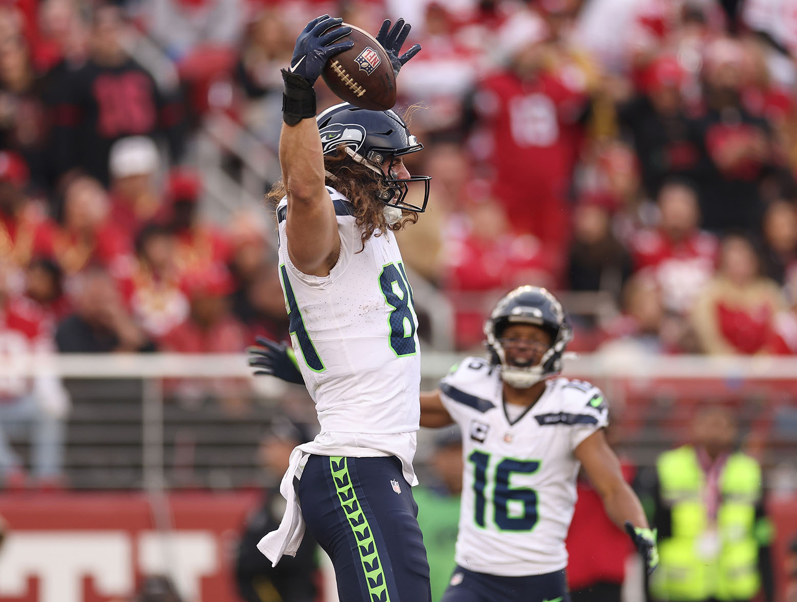 SANTA CLARA, CALIFORNIA - DECEMBER 10: Colby Parkinson #84 of the Seattle Seahawks celebrates after a touchdown during the third quarter in the game against the San Francisco 49ers at Levi's Stadium on December 10, 2023 in Santa Clara, California. (Photo by Ezra Shaw/Getty Images)