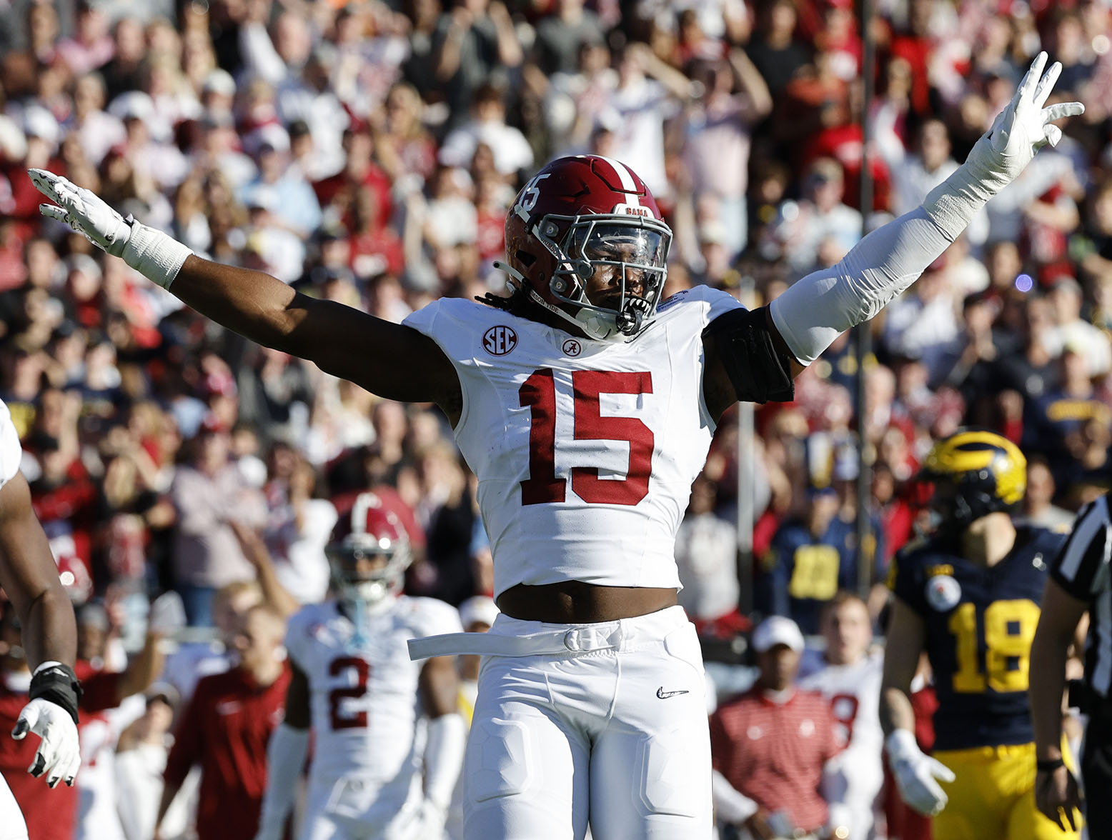 PASADENA, CALIFORNIA - JANUARY 01: Dallas Turner #15 of the Alabama Crimson Tide celebrates in the first quarter against the Michigan Wolverines during the CFP Semifinal Rose Bowl Game at Rose Bowl Stadium on January 01, 2024 in Pasadena, California. (Photo by Kevork Djansezian/Getty Images)