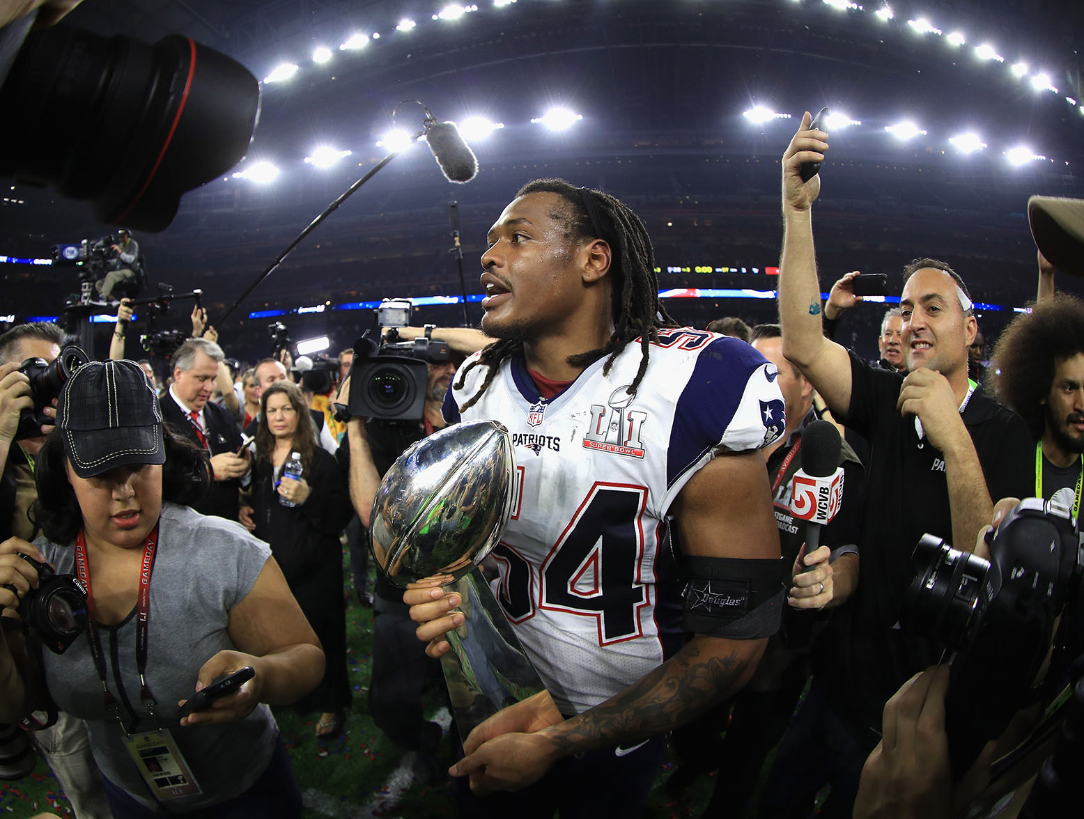 HOUSTON, TX - FEBRUARY 05: Dont'a Hightower #54 of the New England Patriots holds the Vince Lombardi Trophy after defeating the Atlanta Falcons 34-28 in overtime during Super Bowl 51 at NRG Stadium on February 5, 2017 in Houston, Texas. (Photo by Mike Ehrmann/Getty Images)