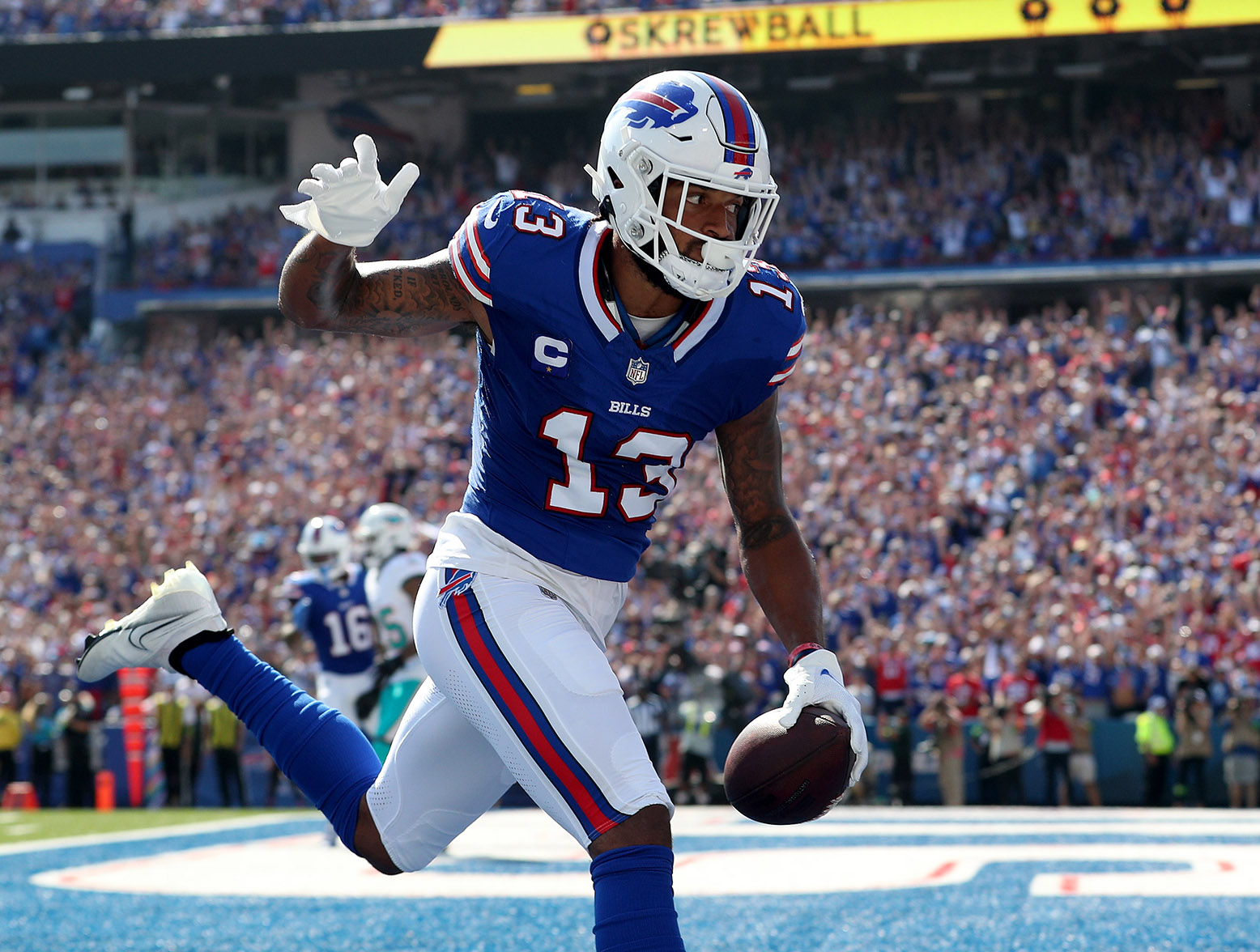 ORCHARD PARK, NEW YORK - OCTOBER 01: Gabe Davis #13 of the Buffalo Bills makes a touchdown reception against the Miami Dolphins during the first quarter at Highmark Stadium on October 01, 2023 in Orchard Park, New York. (Photo by Bryan M. Bennett/Getty Images)