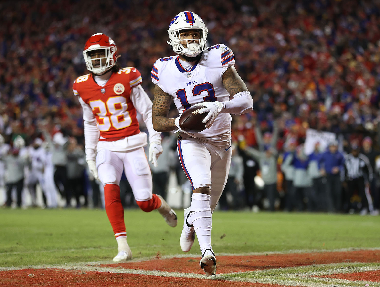 KANSAS CITY, MISSOURI - JANUARY 23: Gabriel Davis #13 of the Buffalo Bills celebrates after scoring a 75 yard touchdown against the Kansas City Chiefs during the fourth quarter in the AFC Divisional Playoff game at Arrowhead Stadium on January 23, 2022 in Kansas City, Missouri. (Photo by Jamie Squire/Getty Images)