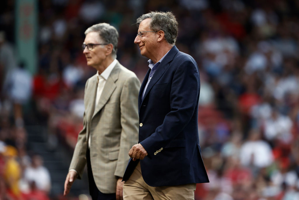 BOSTON, MA - JUNE 26: Chairman of the Boston Red Sox Tom Werner and principle owner John Henry walk on the field before the game between the Boston Red Sox and the New York Yankees at Fenway Park on June 26, 2021 in Boston, Massachusetts. (Photo By Winslow Townson/Getty Images)