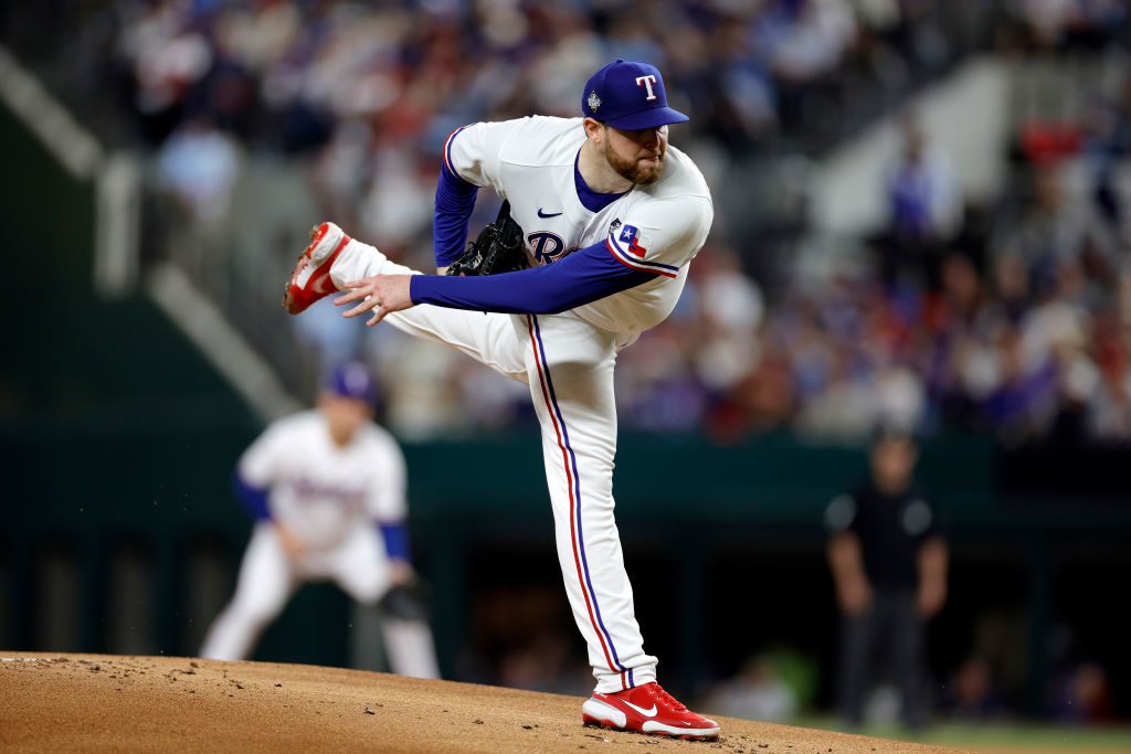 ARLINGTON, TEXAS - OCTOBER 28: Jordan Montgomery #52 of the Texas Rangers pitches in the first inning against the Arizona Diamondbacks during Game Two of the World Series at Globe Life Field on October 28, 2023 in Arlington, Texas. (Photo by Carmen Mandato/Getty Images)